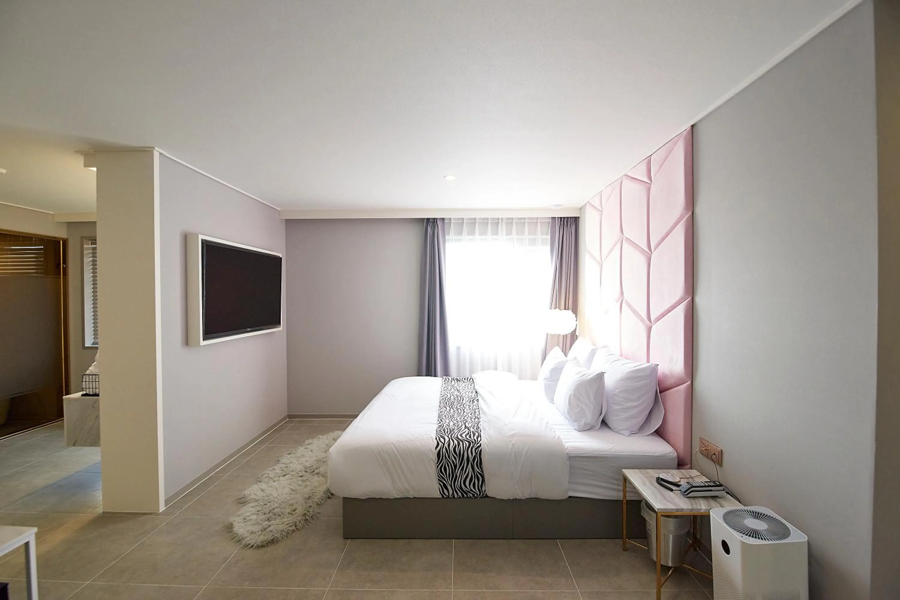 Bed in Denbasta Hotel