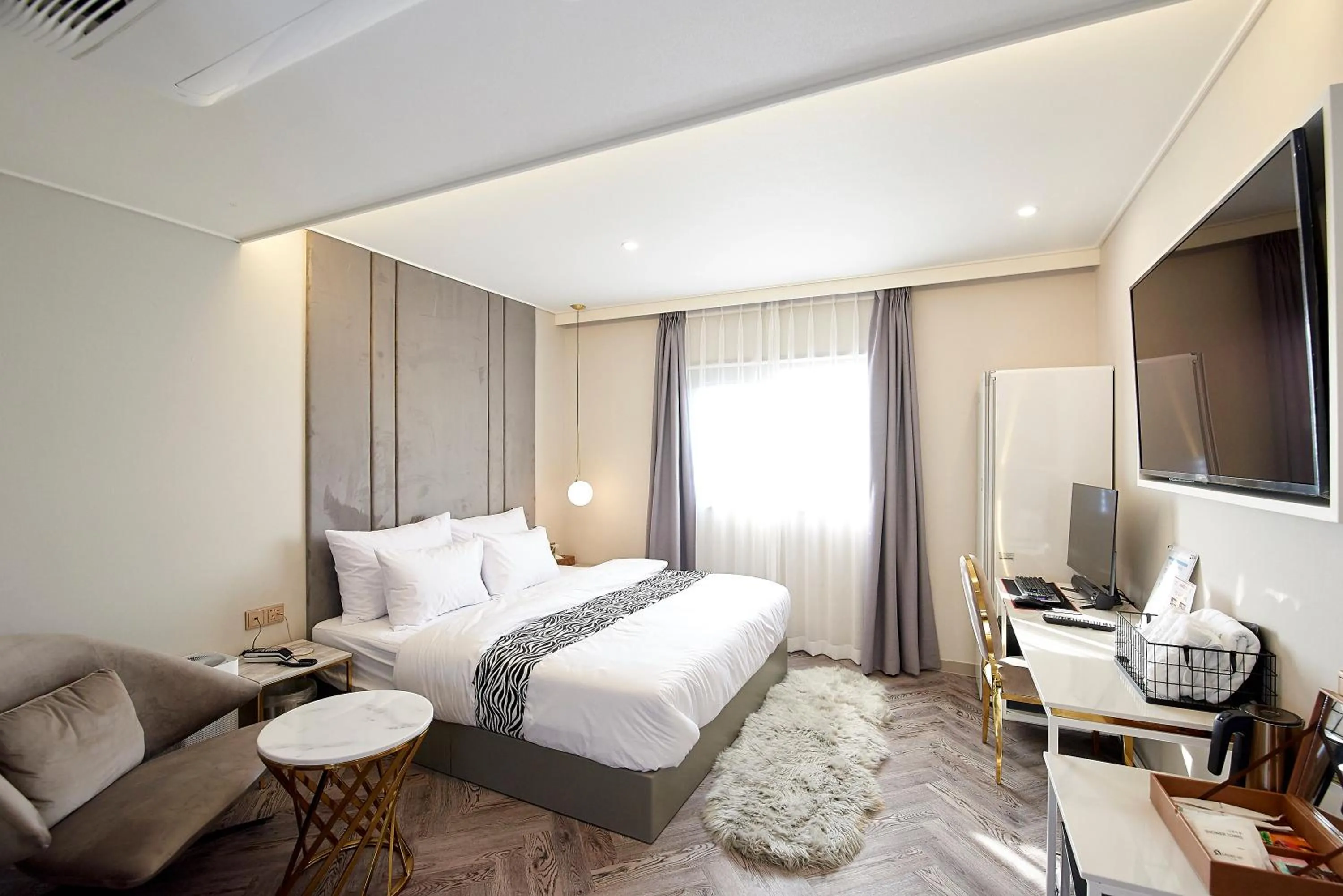 Bed in Denbasta Hotel