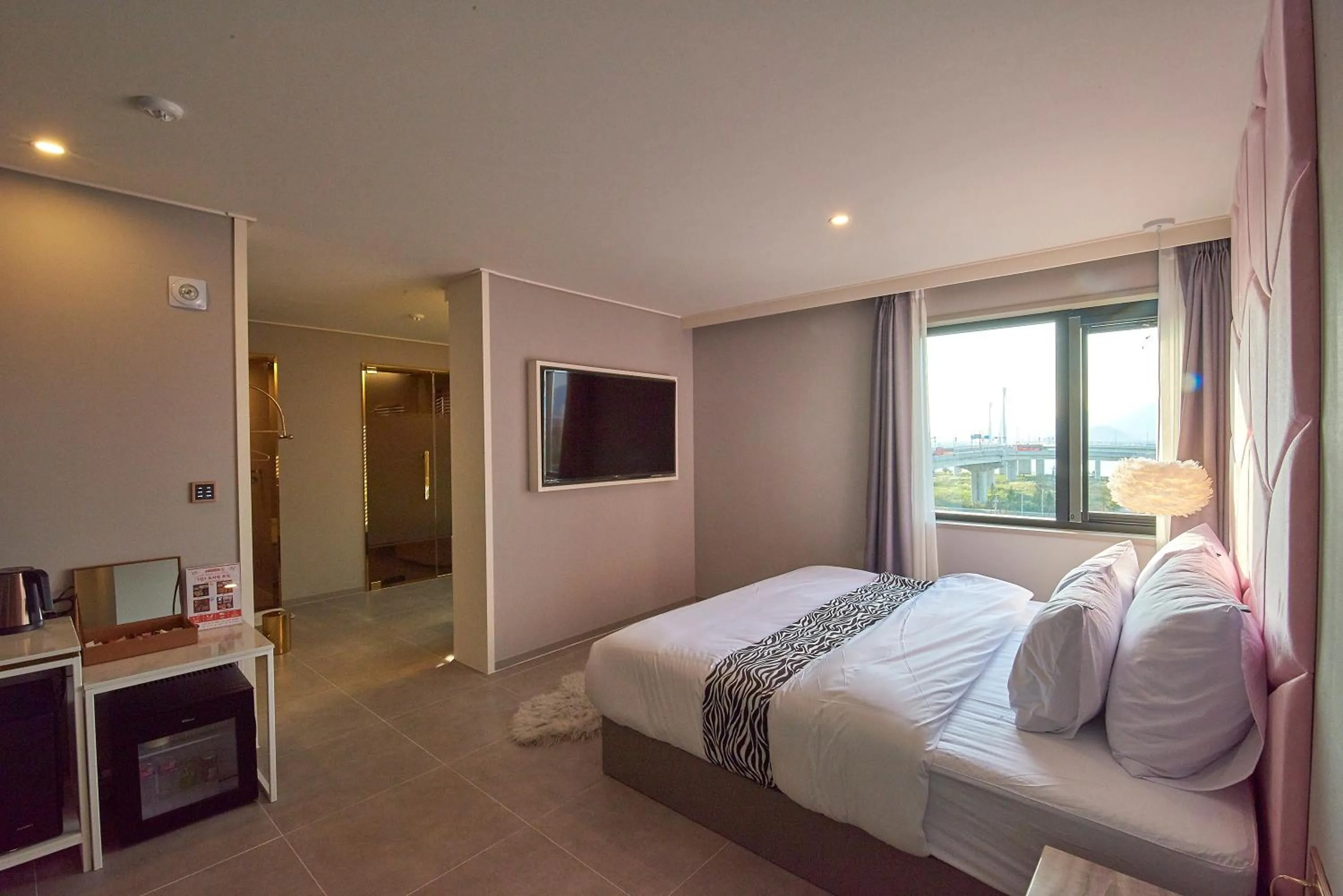 Bed in Denbasta Hotel