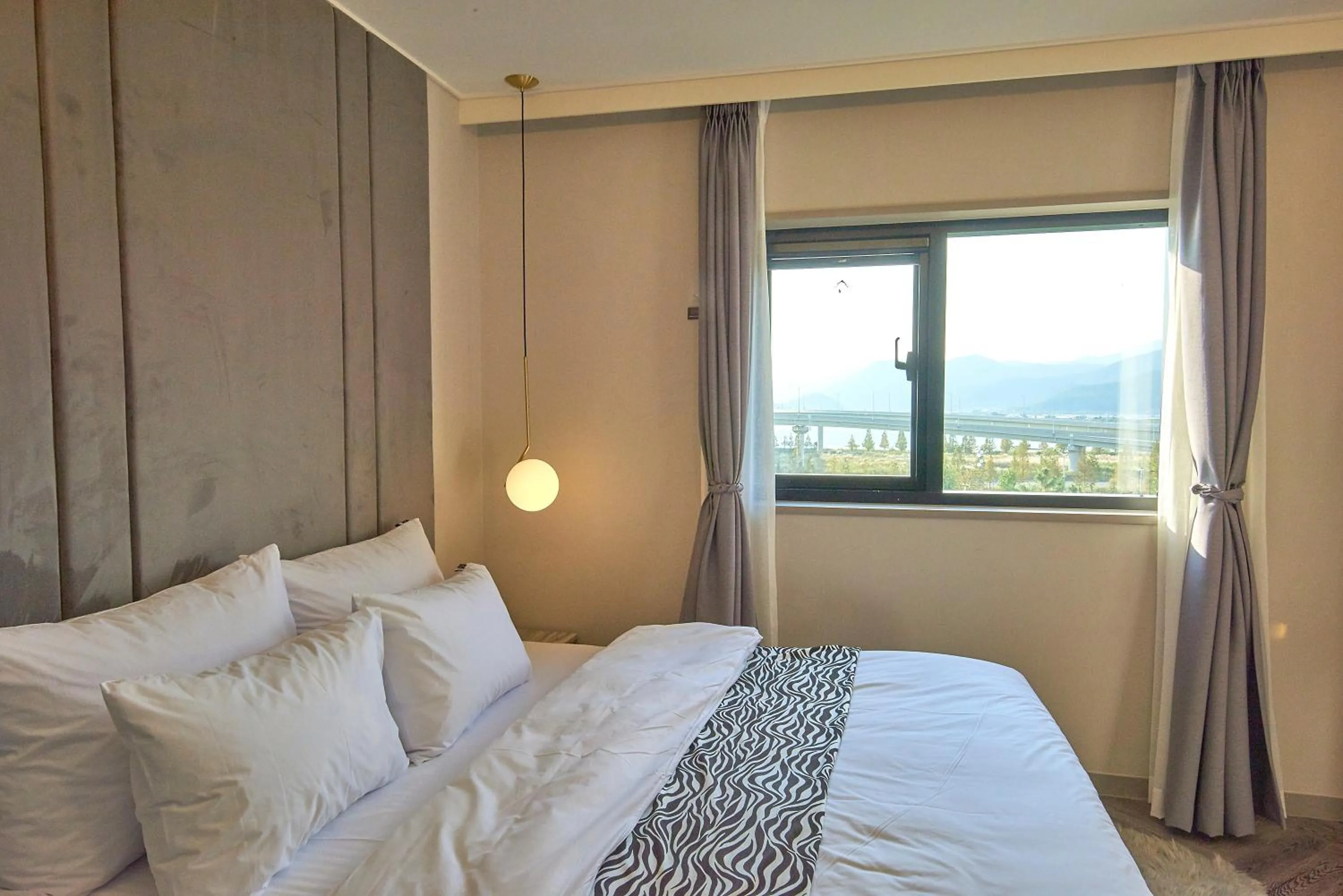 Bed in Denbasta Hotel