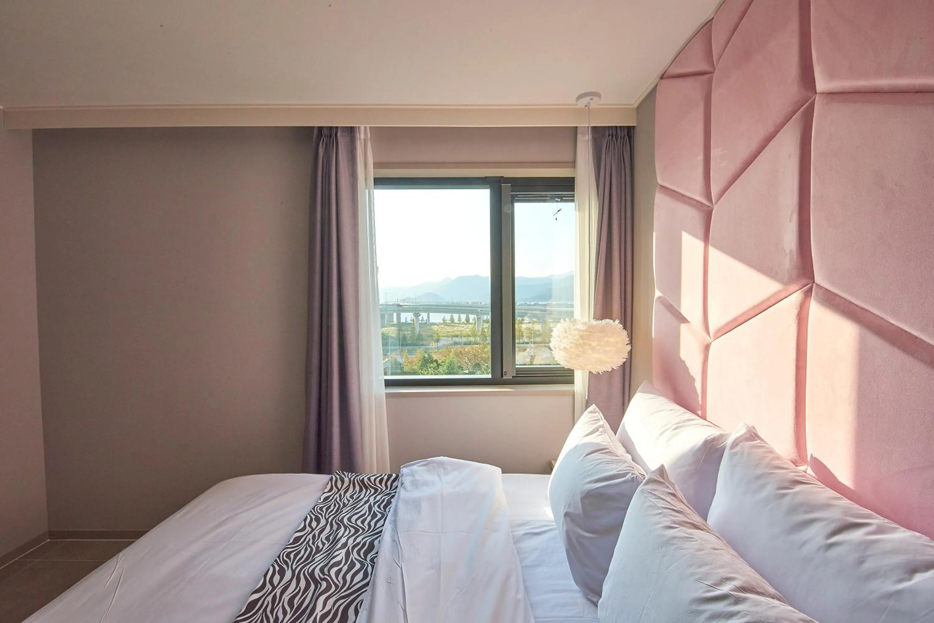 Bed in Denbasta Hotel