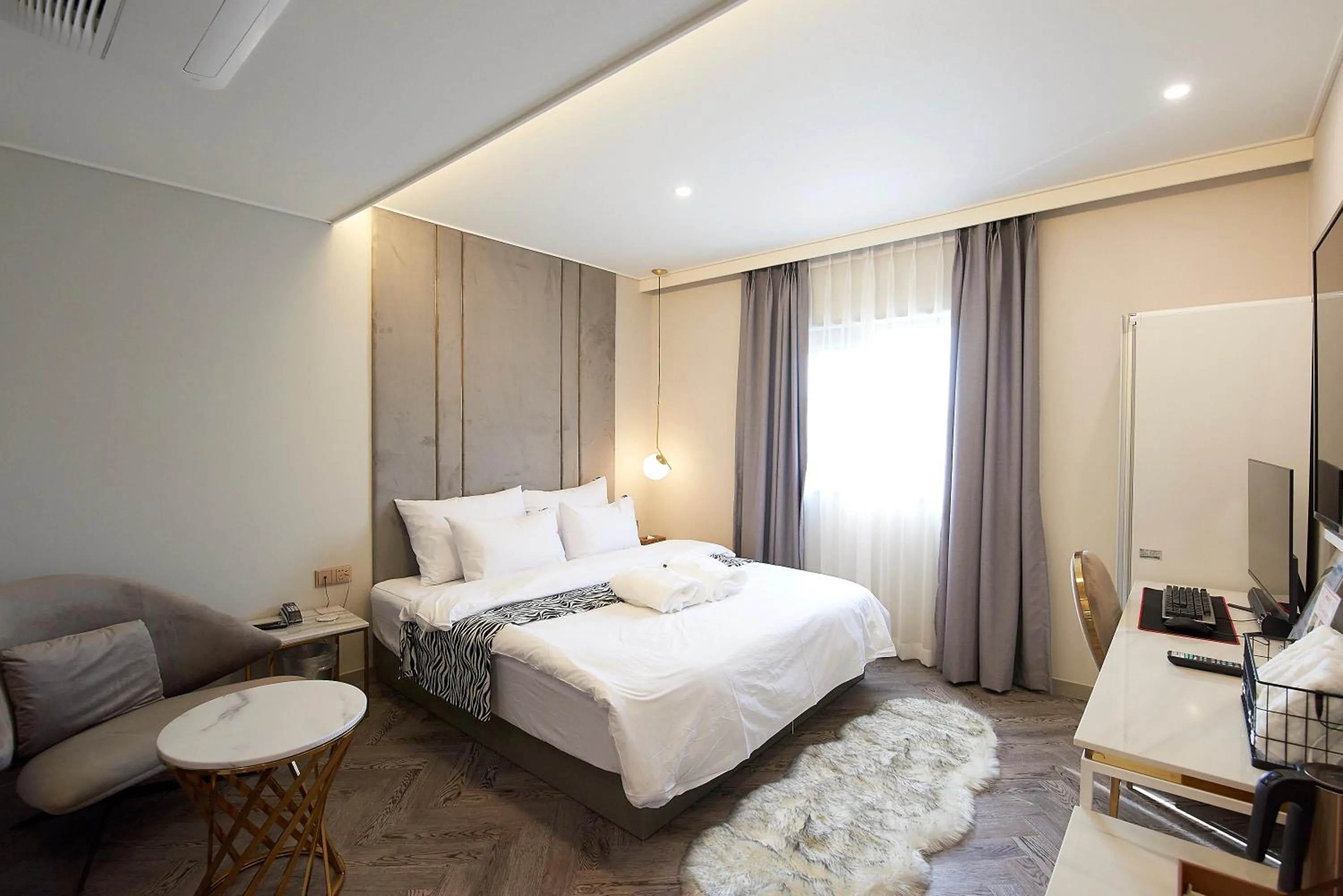 Bed in Denbasta Hotel
