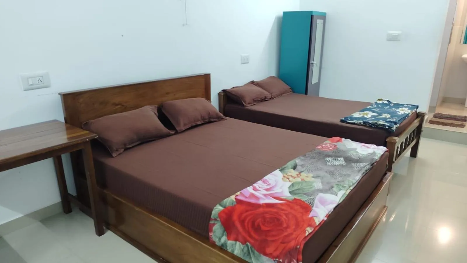 Bed in CHILLAX Resorts Palakkayam THATTU