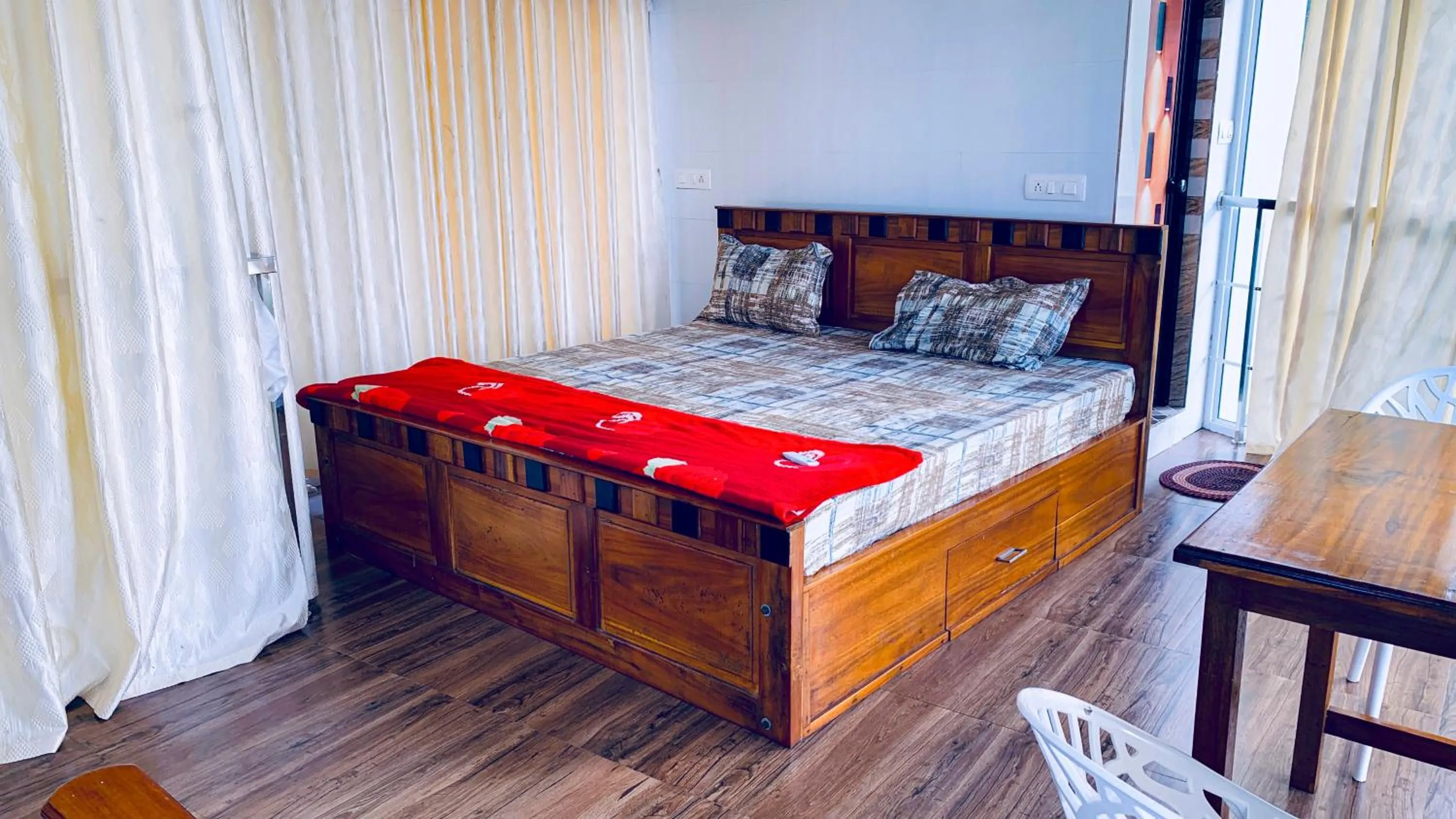 Bed in CHILLAX Resorts Palakkayam THATTU