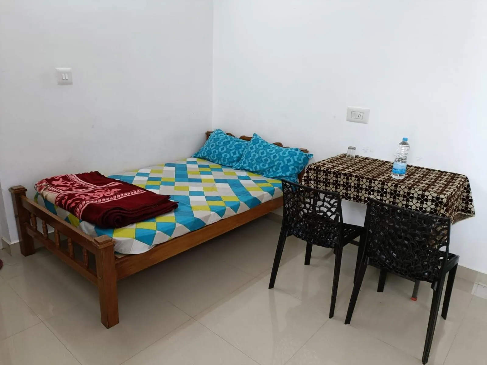 Bed in CHILLAX Resorts Palakkayam THATTU
