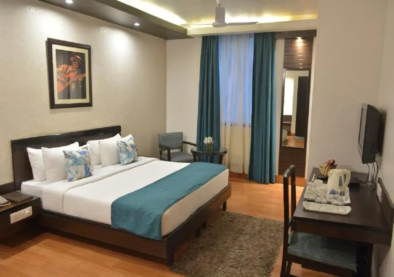 Bedroom, Bed in Hotel Rockland Panchsheel Enclave Bedroom, Bed in Hotel Rockland Panchsheel Enclave