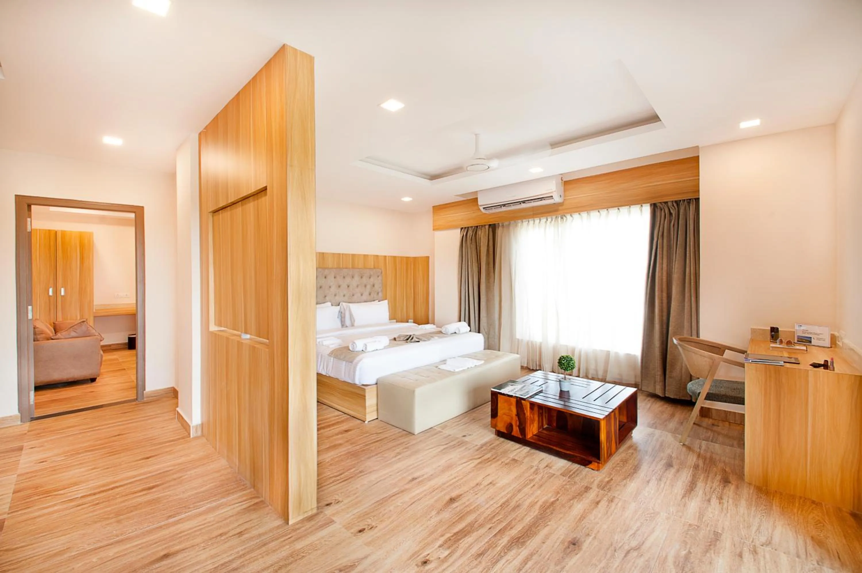 Seating area, Bed in ABM Boutique Hotel