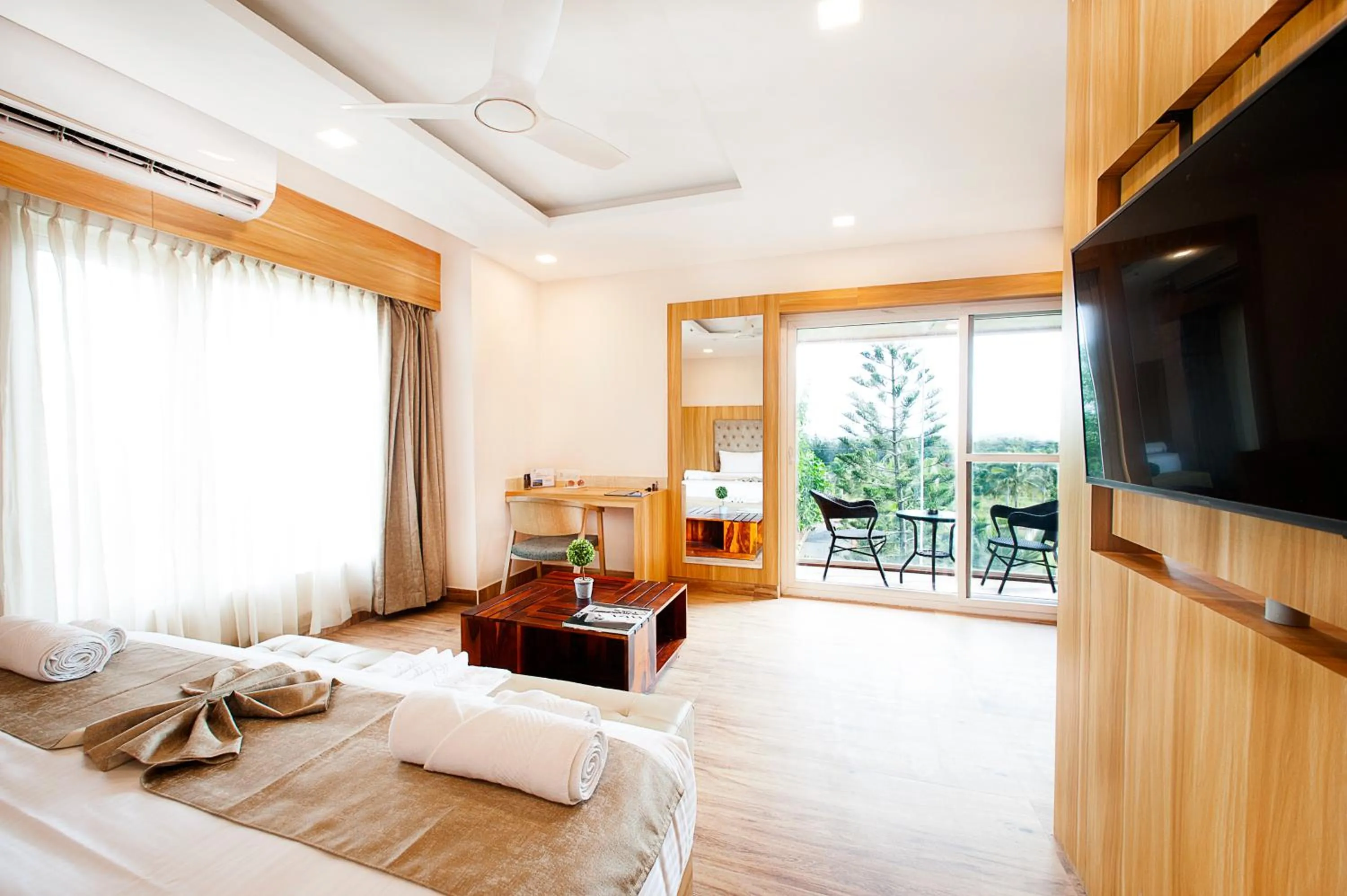 Seating area, Bed in ABM Boutique Hotel