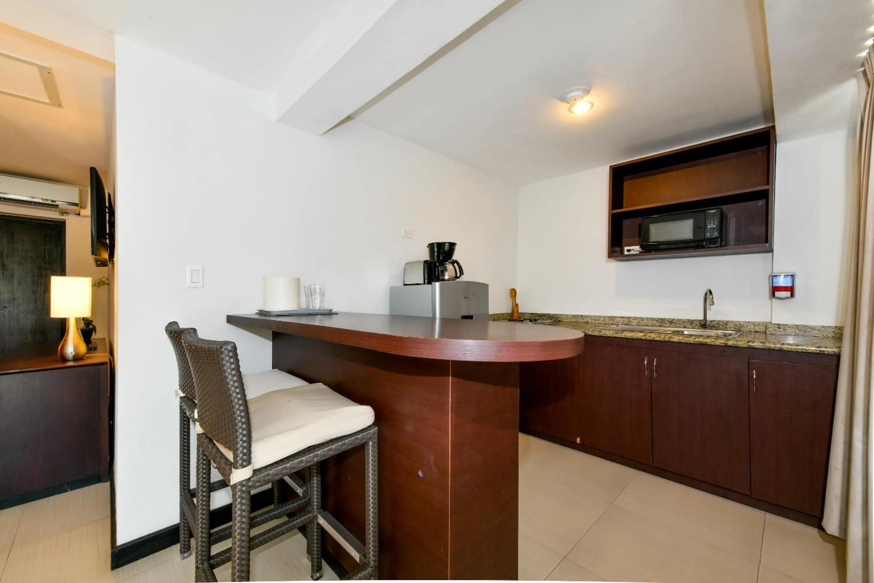 Kitchen or kitchenette in Talk of the Town Beach Hotel & Beach Club by GH Hoteles