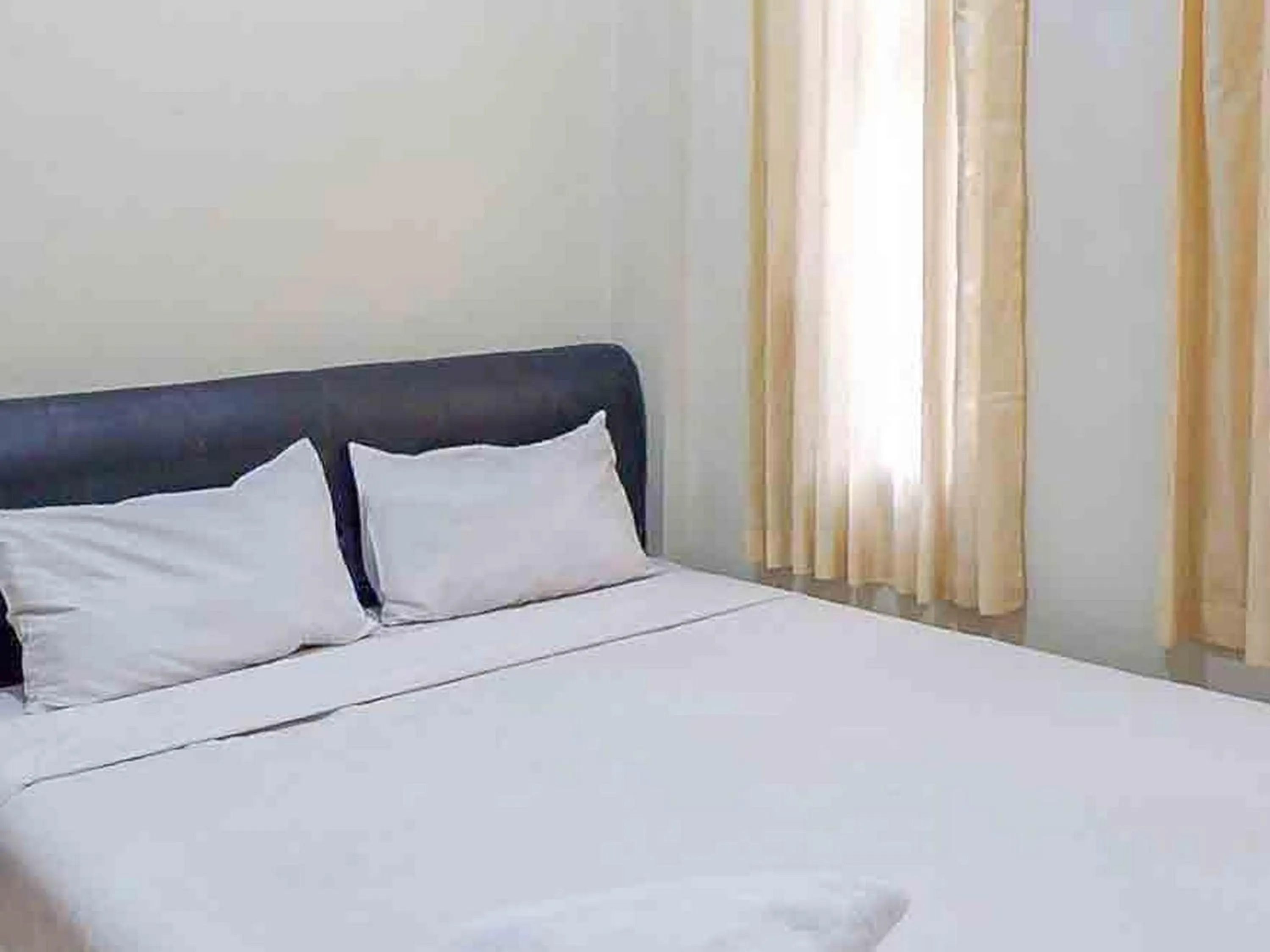 Bed in Griya Fadamas Syariah near Taman Hijau Demangan Madiun Mitra RedDoorz