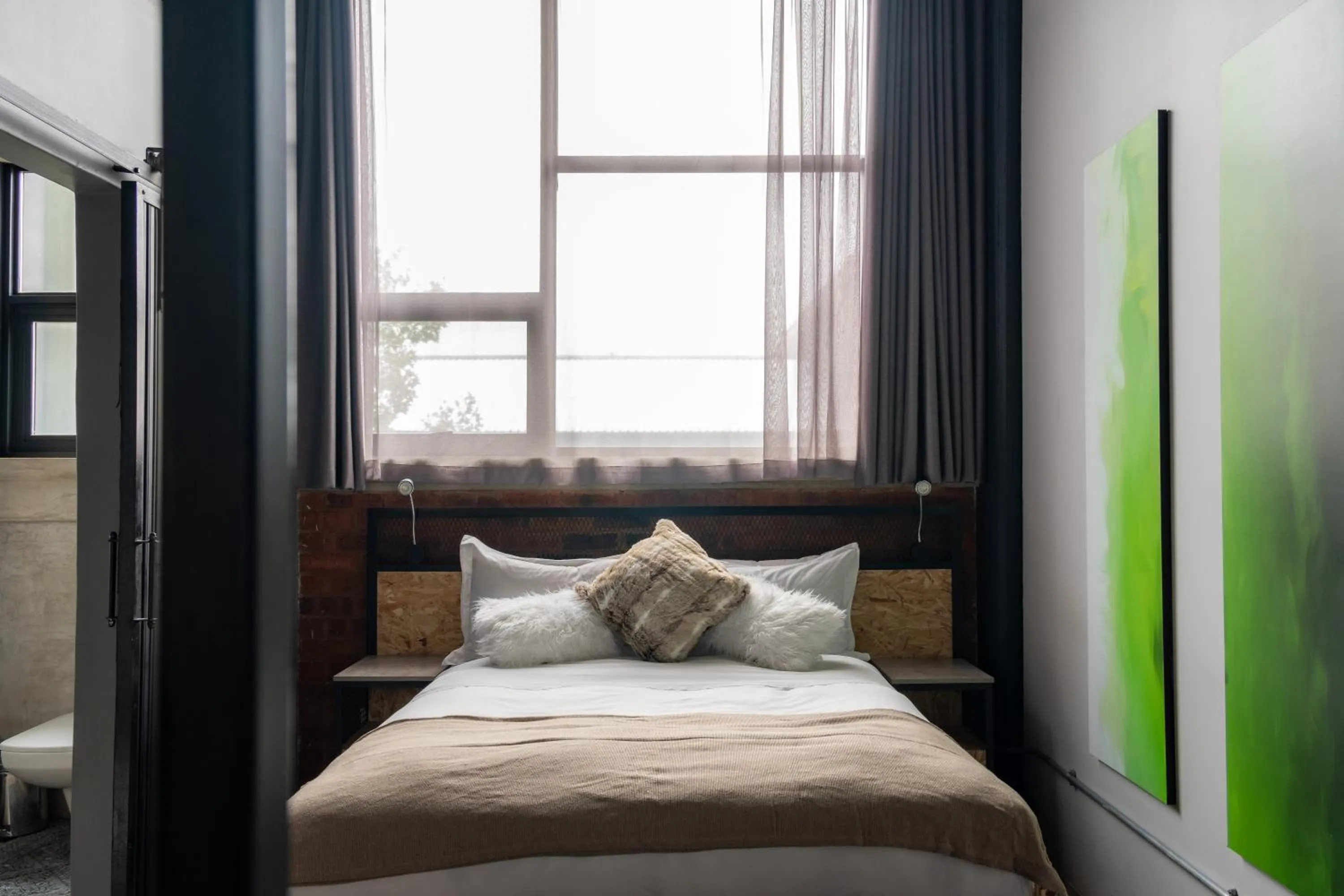 Bed in Lilian Lofts Hotel & Spa