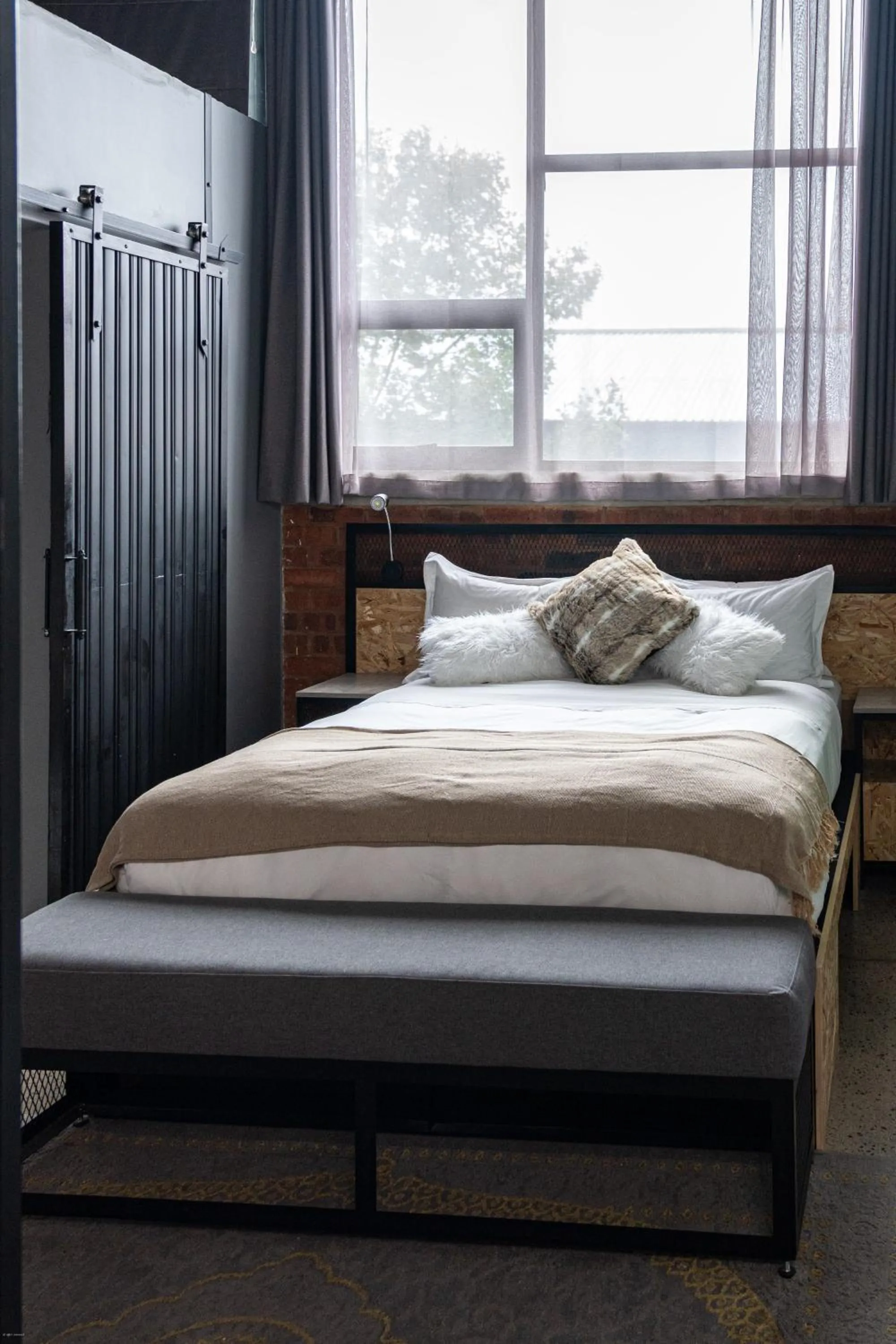 Bed in Lilian Lofts Hotel & Spa