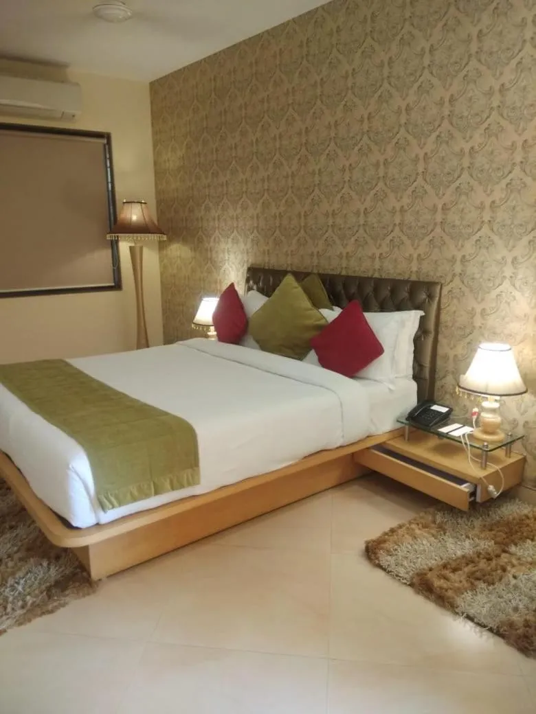Bed in Meritas Seawind Beach Resort, Shrivardhan