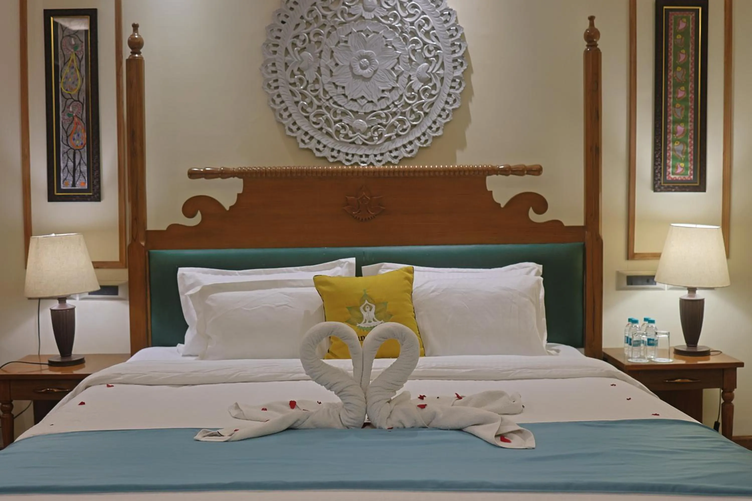 Bed in Punarnava Resort & Spa