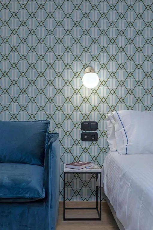 Bed in Acro Urban Suites