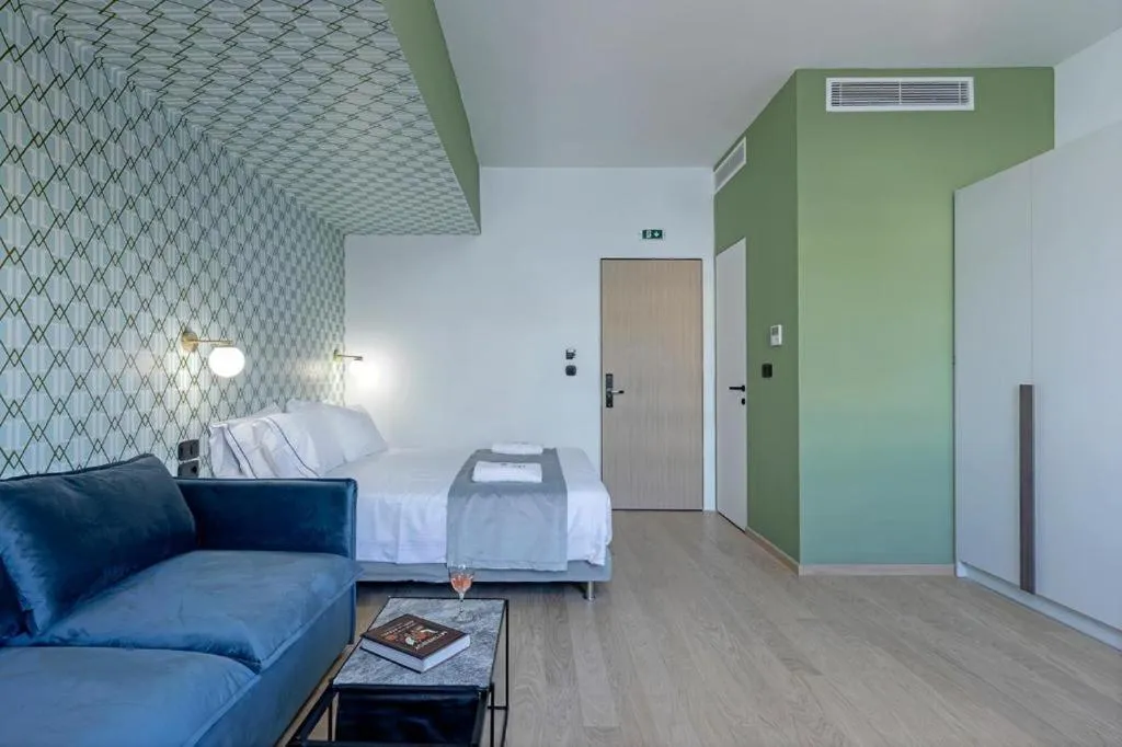 Bed in Acro Urban Suites