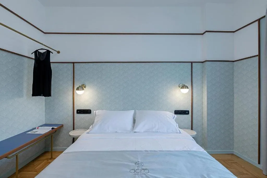 Bed in Acro Urban Suites