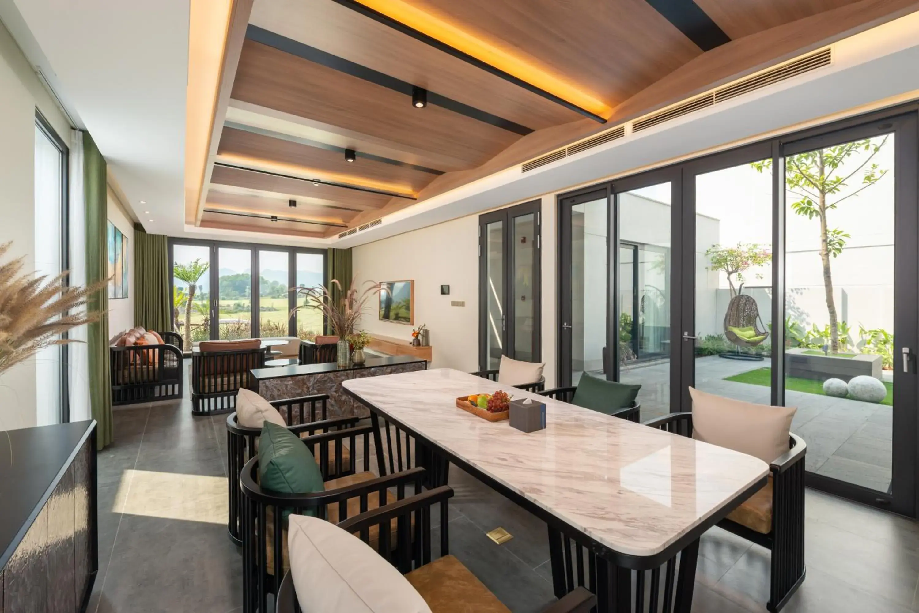 Living room in The Five Resort & Golf Hoang Gia Ninh Binh Living room in The Five Resort & Golf Hoang Gia Ninh Binh