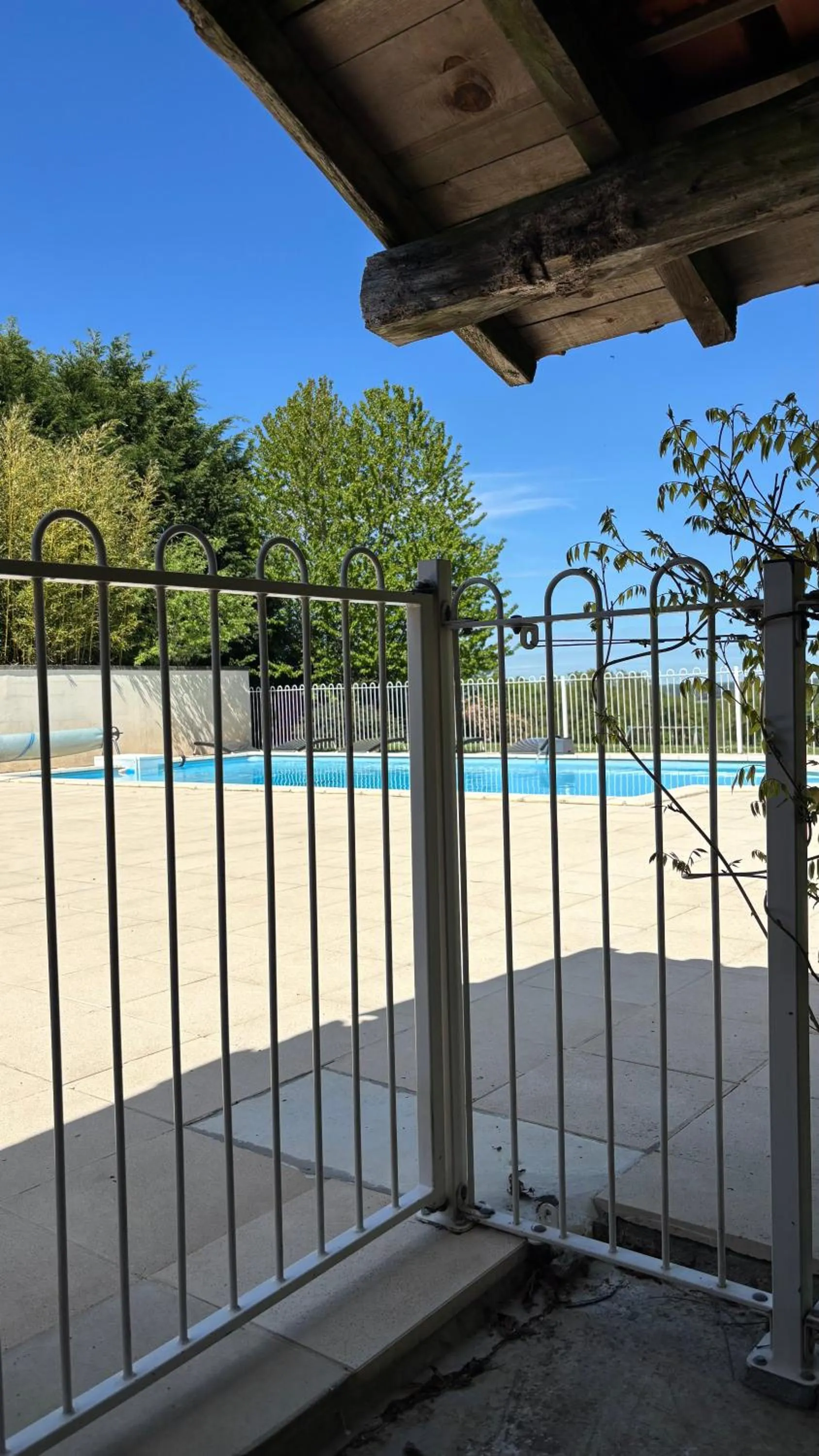 Swimming pool in A L'Ombre Du Marronnier GITES