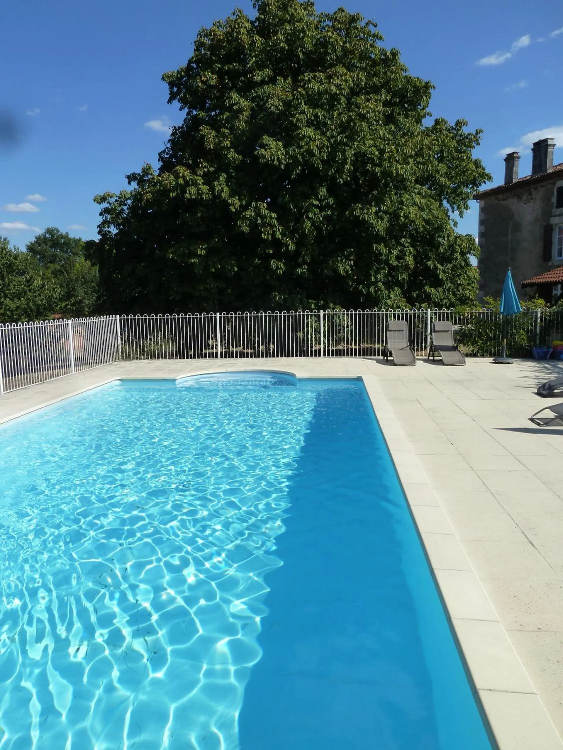 Swimming pool in A L'Ombre Du Marronnier GITES