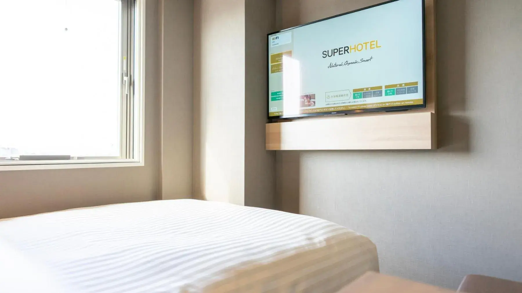 Bed in Super Hotel Kanku Kumatoriekimae Bed in Super Hotel Kanku Kumatoriekimae