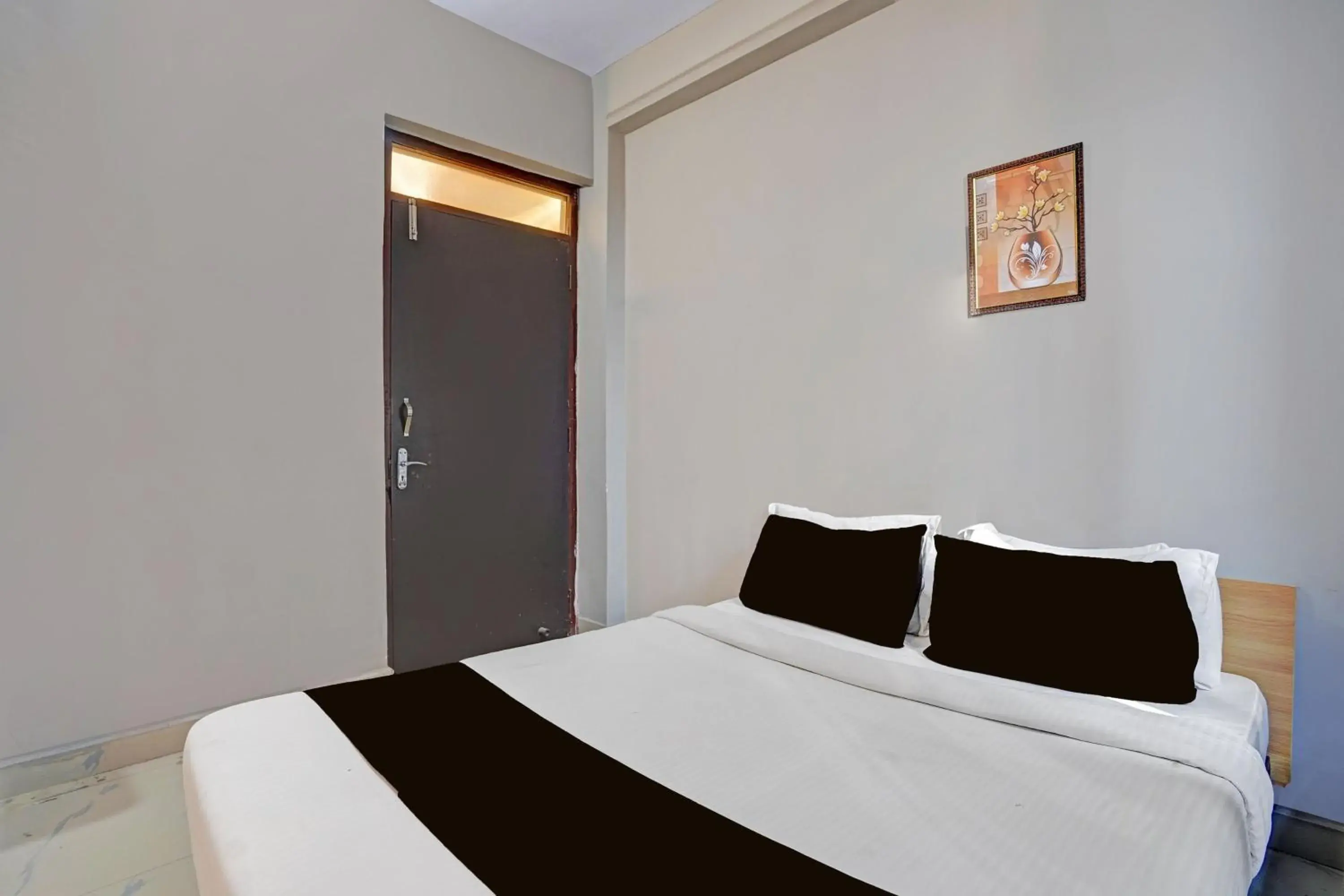 Bedroom, Bed in Super Hotel O AG Colony Park Patna Formerly Capital Pearl Bedroom, Bed in Super Hotel O AG Colony Park Patna Formerly Capital Pearl