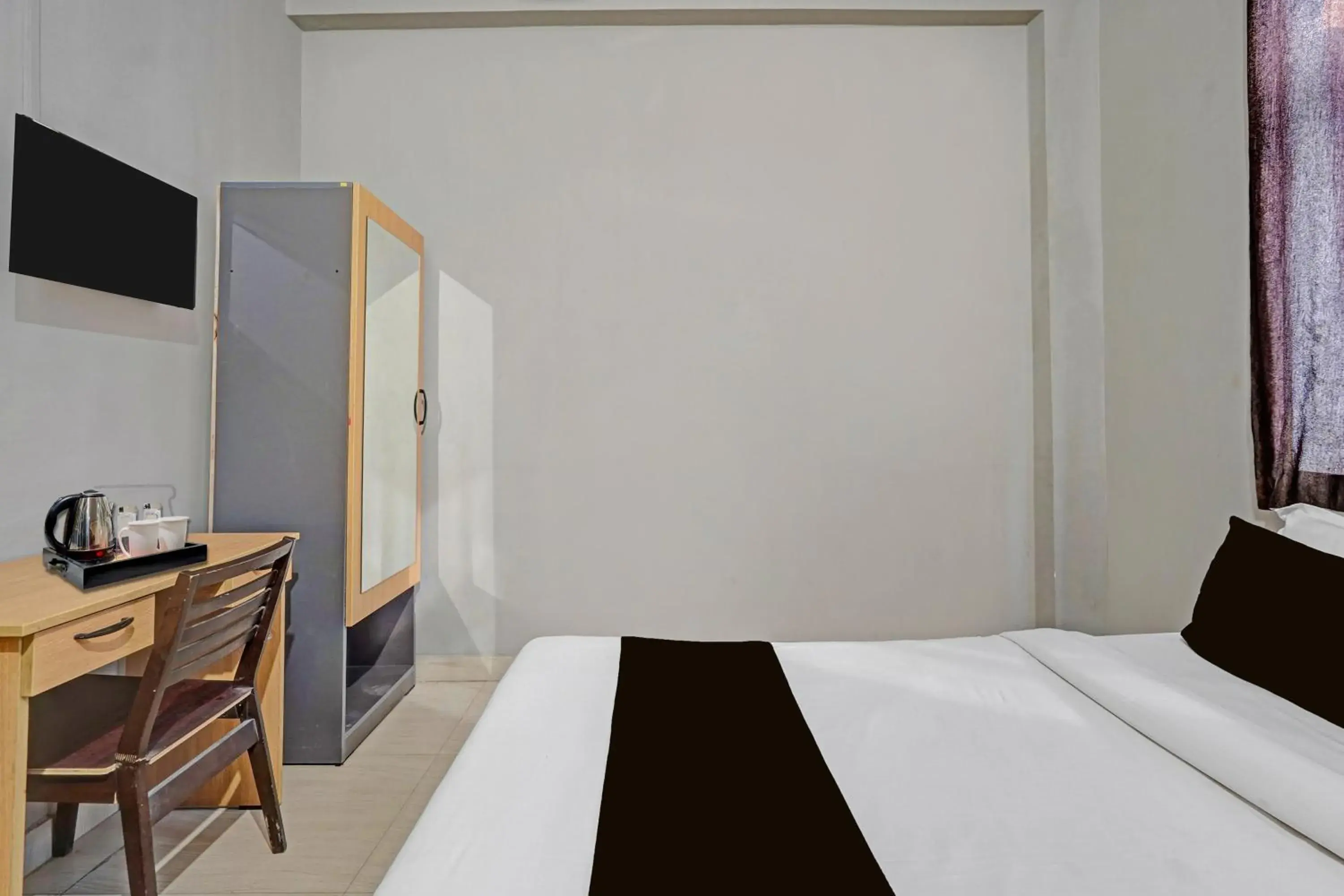 Bedroom, Bed in Super Hotel O AG Colony Park Patna Formerly Capital Pearl Bedroom, Bed in Super Hotel O AG Colony Park Patna Formerly Capital Pearl