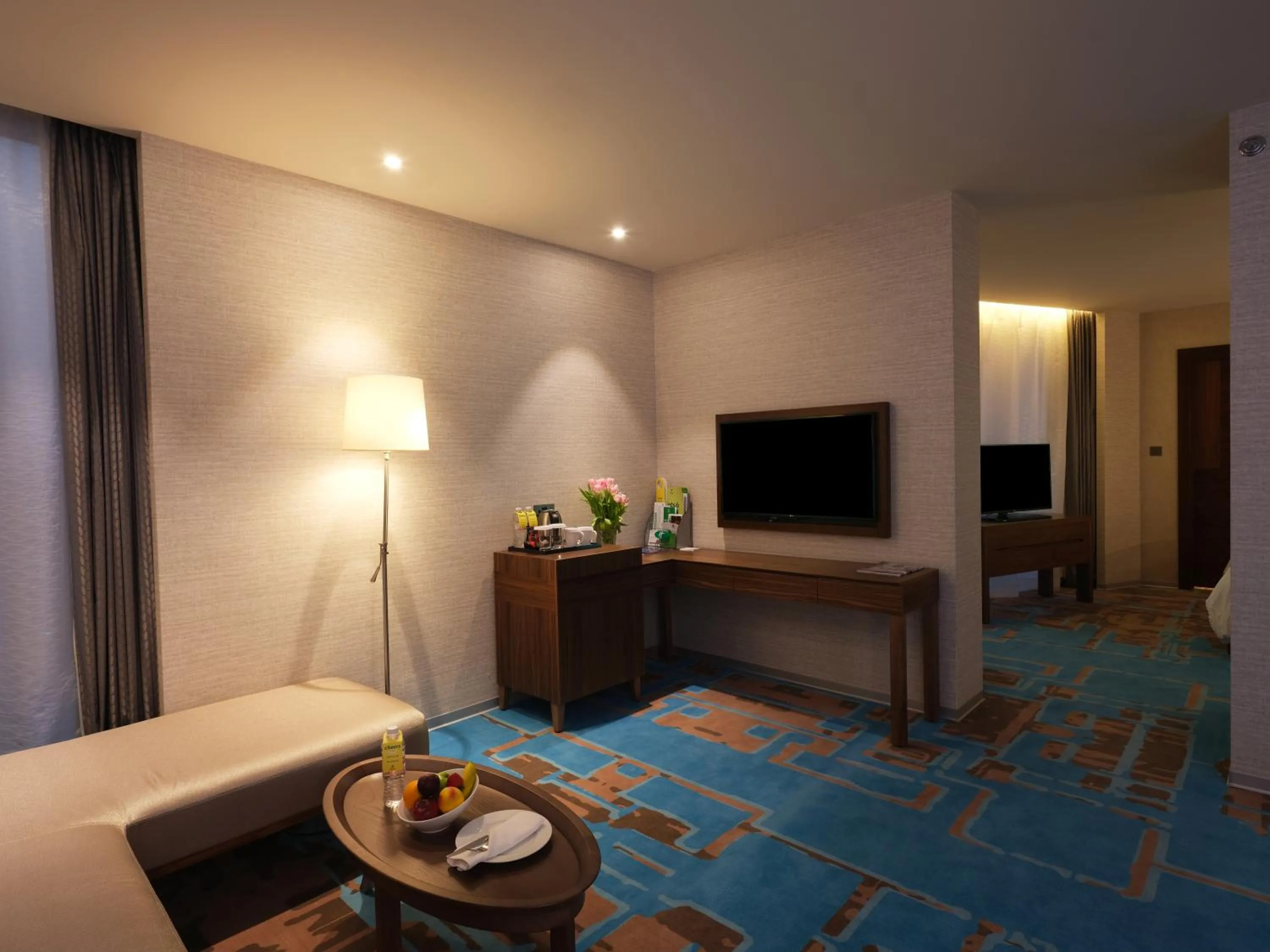 Living room, Bed in Holiday Inn Kuwait Al Thuraya City by IHG