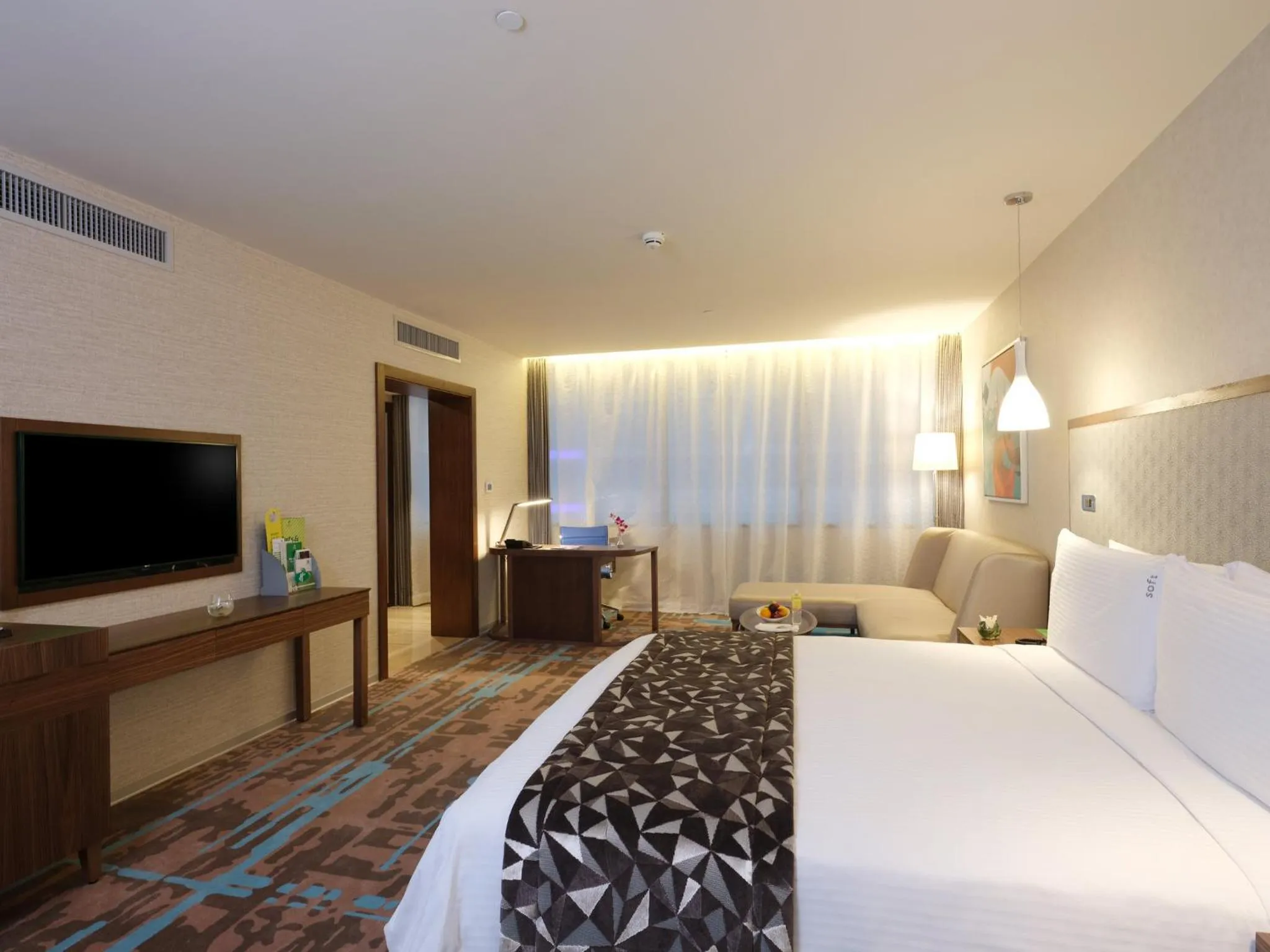 Photo of the whole room, Bed in Holiday Inn Kuwait Al Thuraya City by IHG