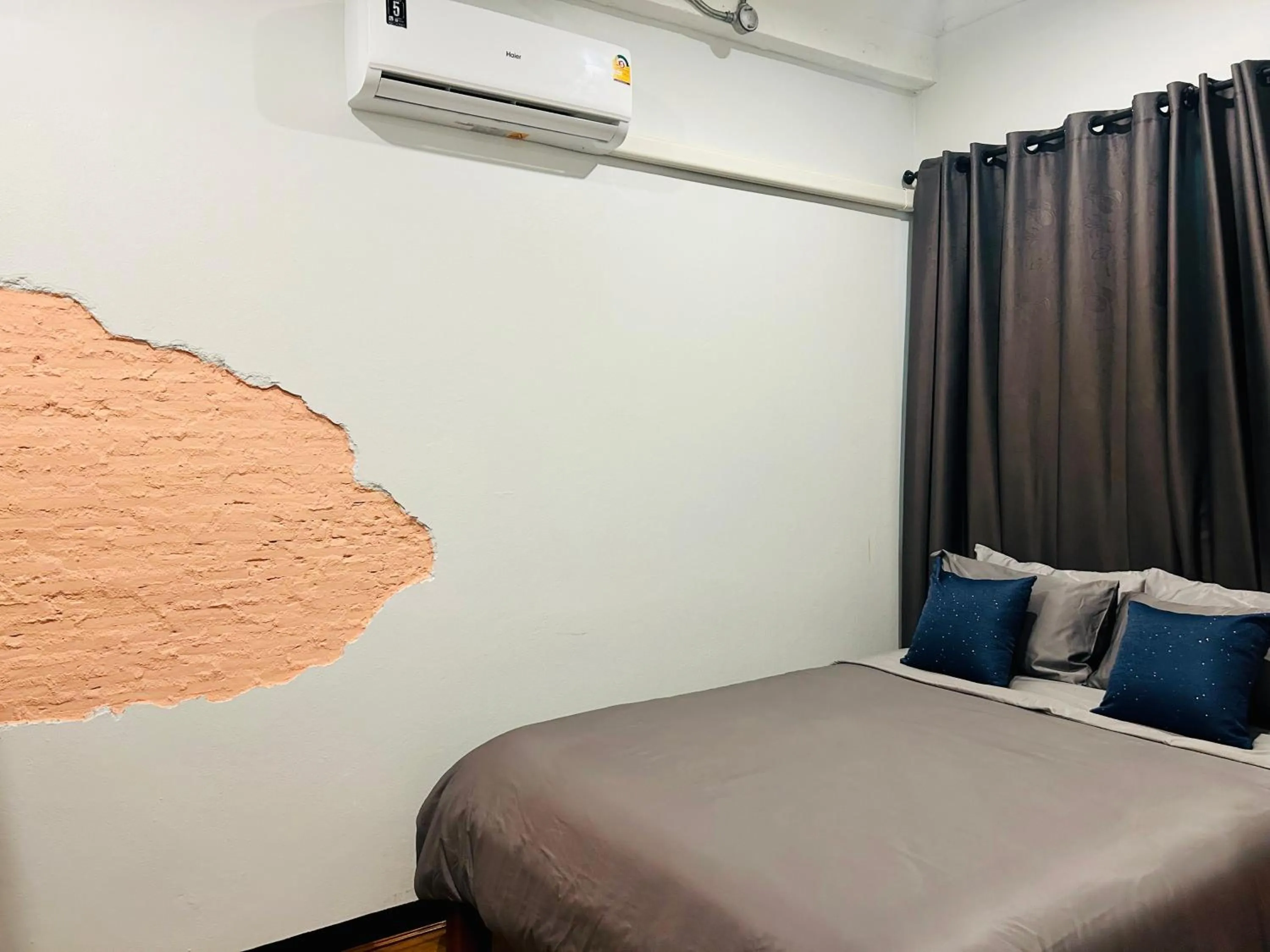 air conditioner, Bed in Chern Chiangmai Boutique Hotel