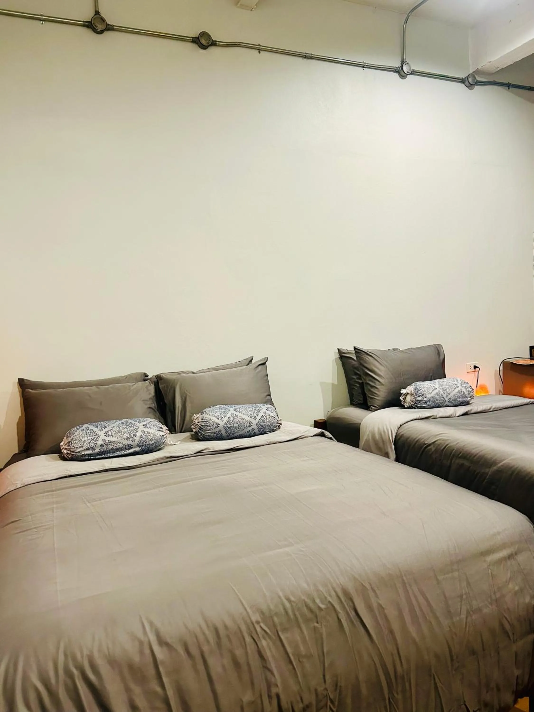 Bed in Chern Chiangmai Boutique Hotel