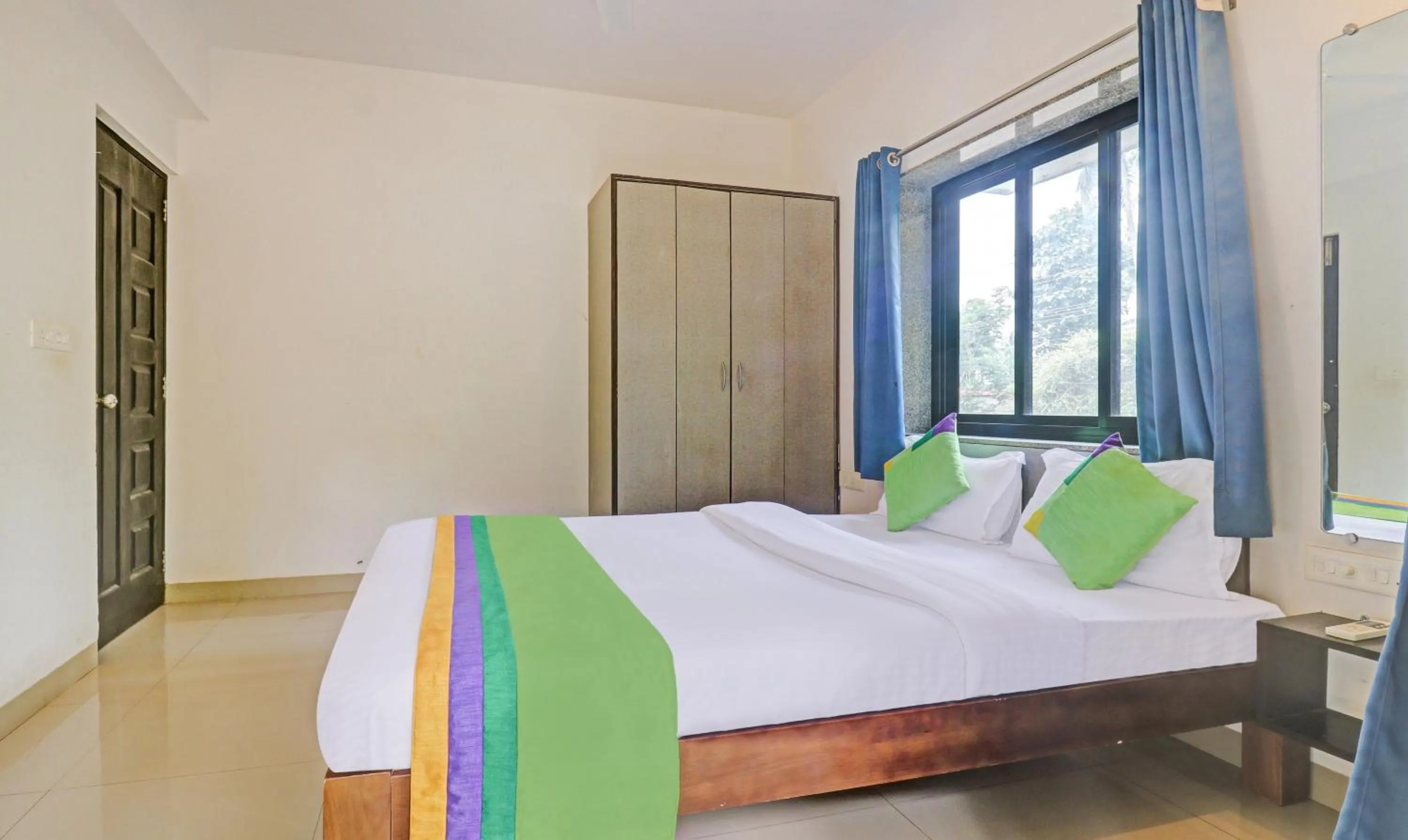 Bedroom, Bed in Treebo Aquamarine Arpora With Pool