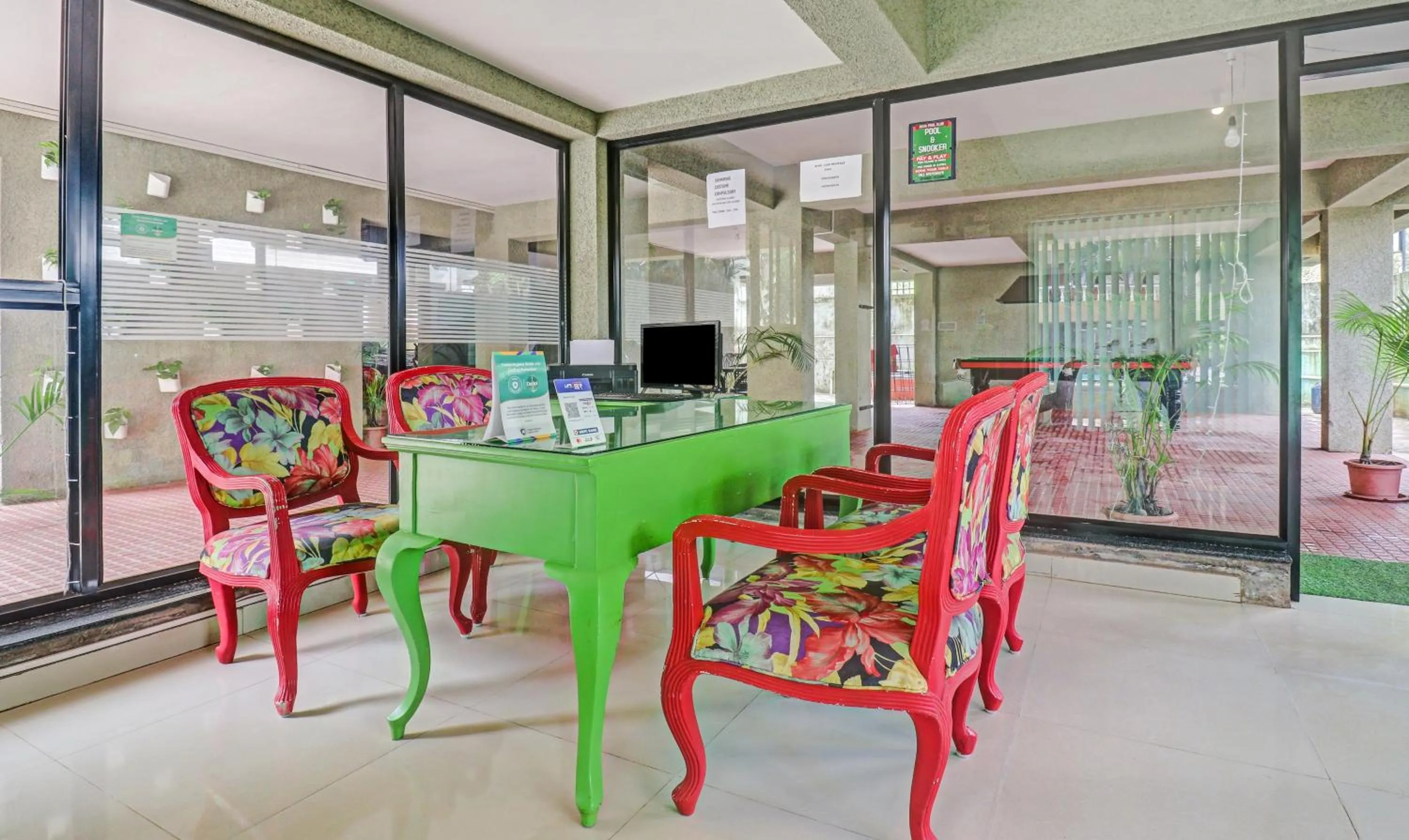 Lobby or reception in Treebo Aquamarine Arpora With Pool
