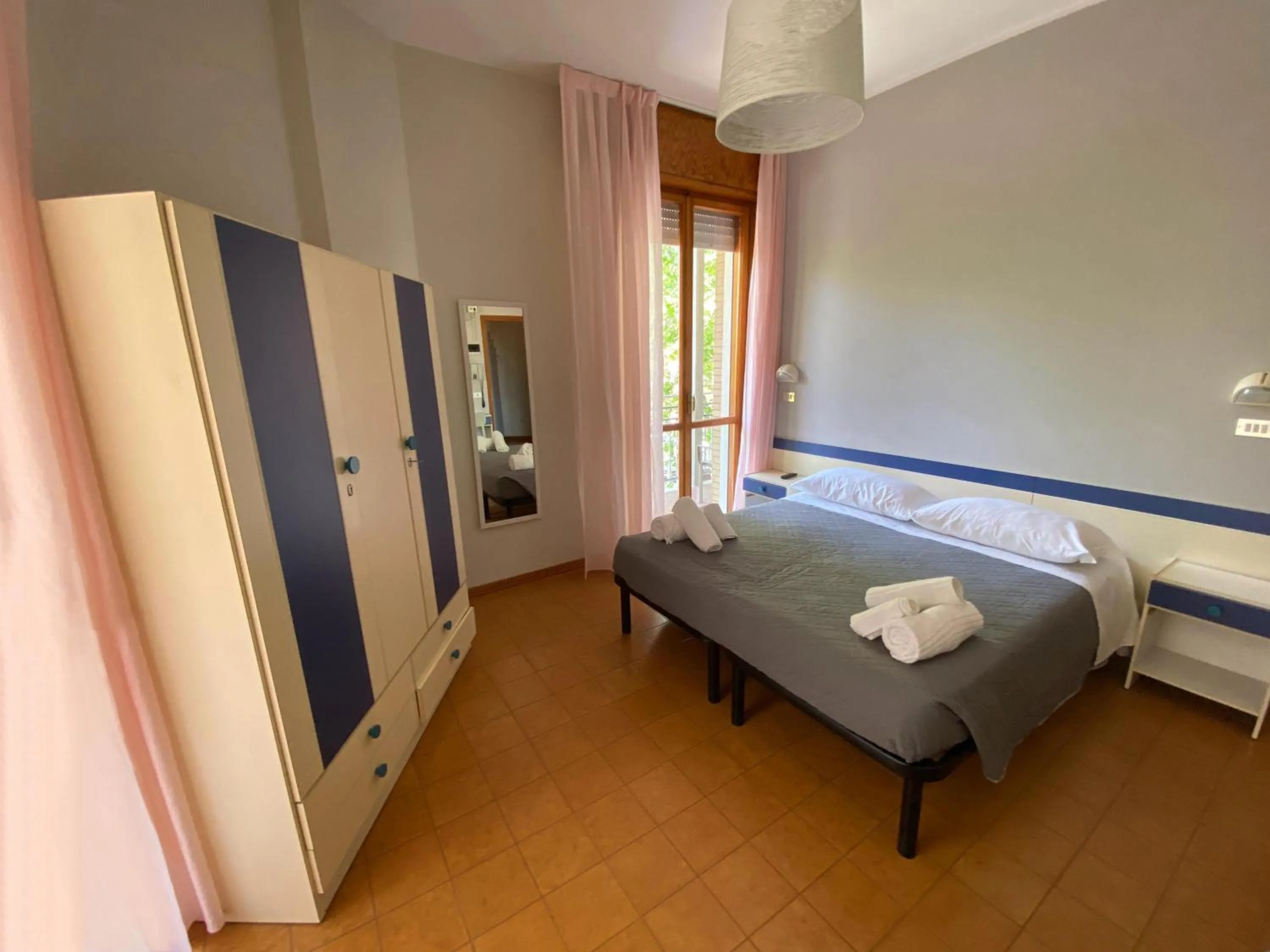 Bedroom in Hotel Residence Ponente