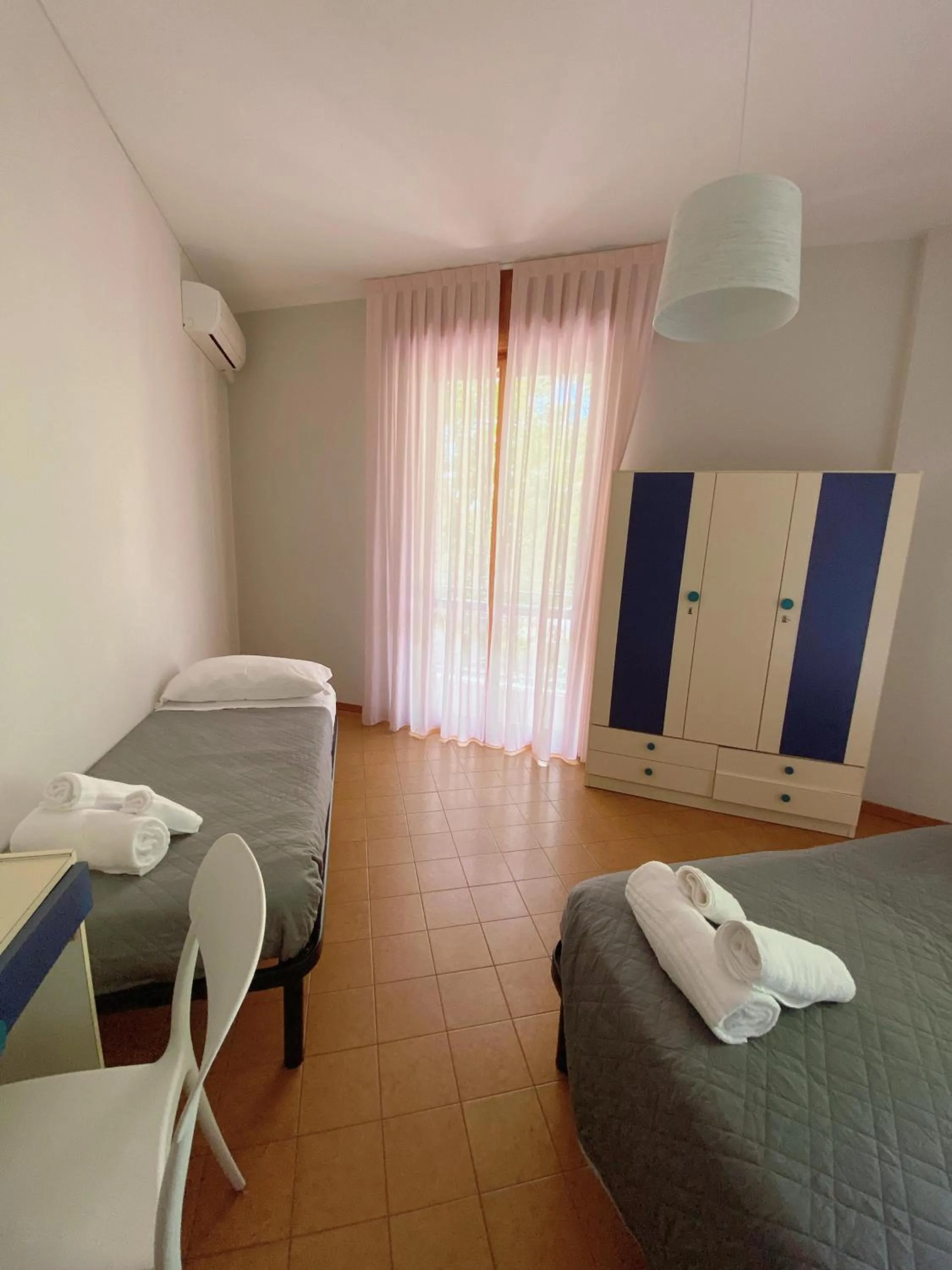Bedroom in Hotel Residence Ponente