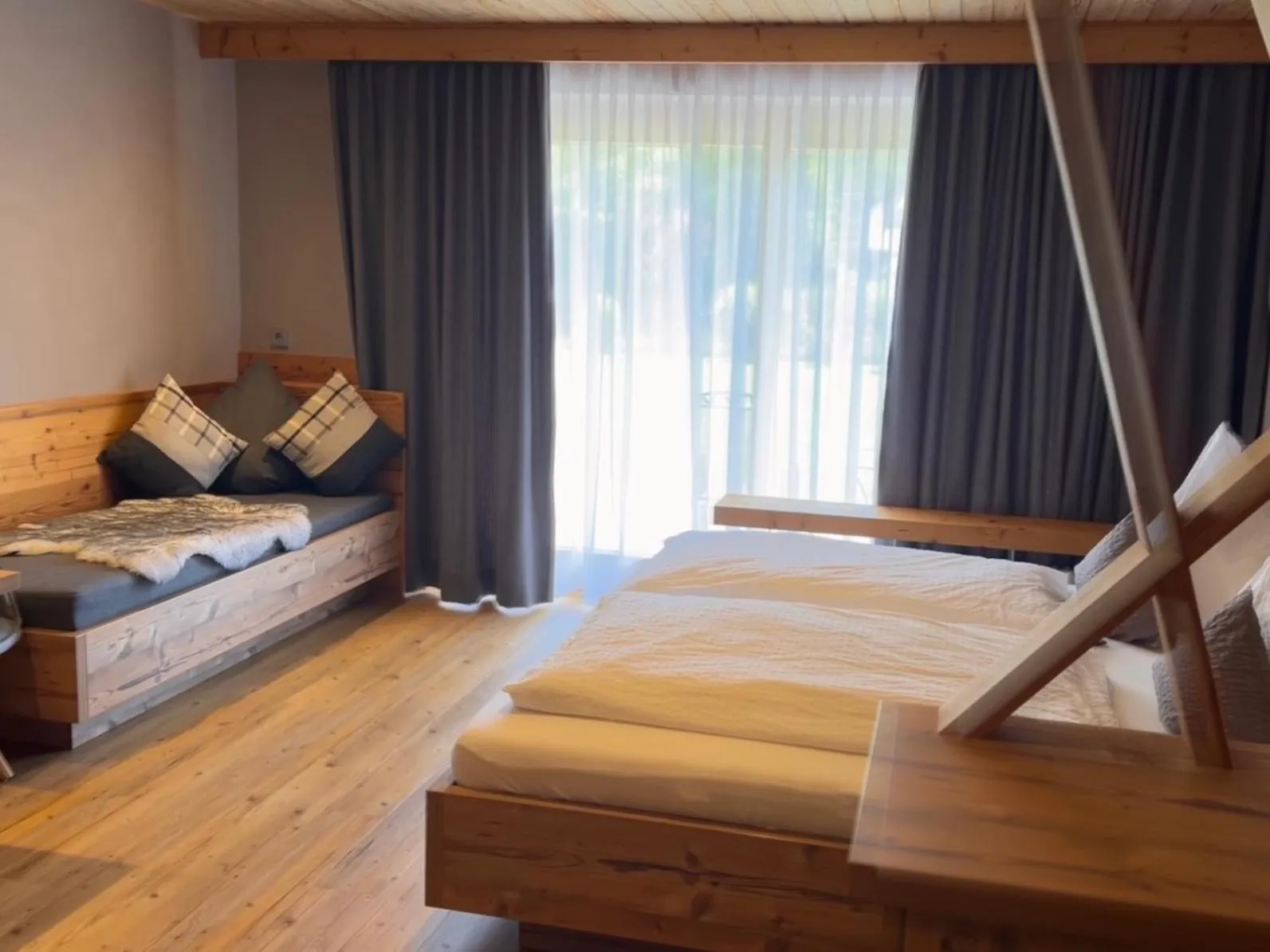 Photo of the whole room, Bed in Gästehaus Edlhuber