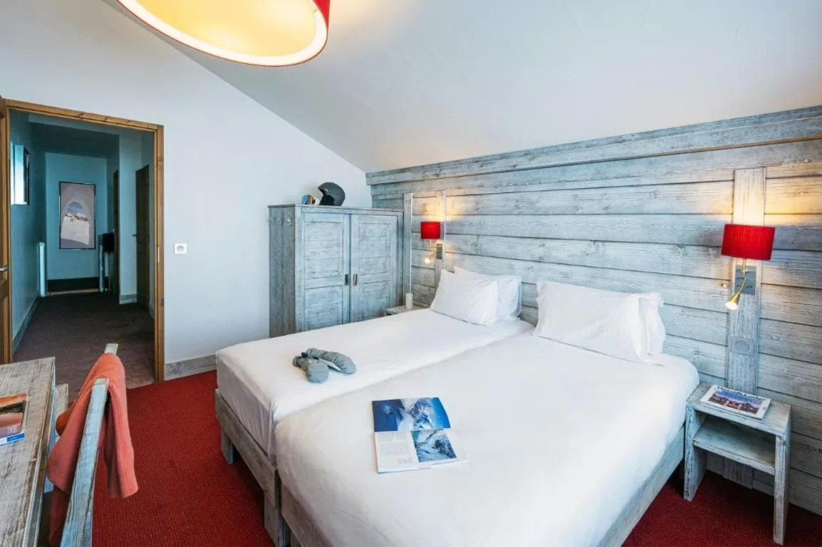 Bed in Hôtel L'Aiguille Percée