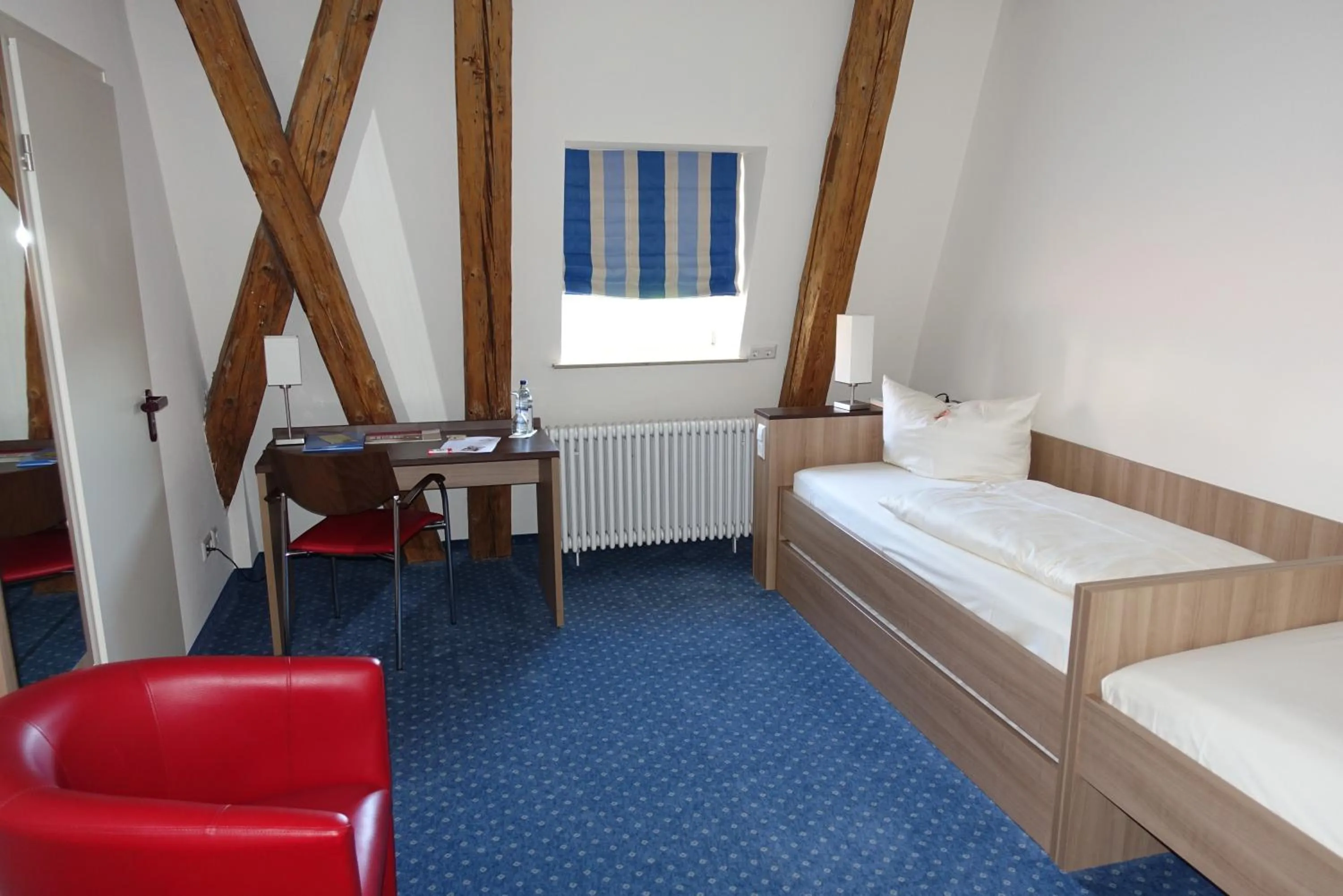 Photo of the whole room, Bed in Tagungshaus Schönenberg