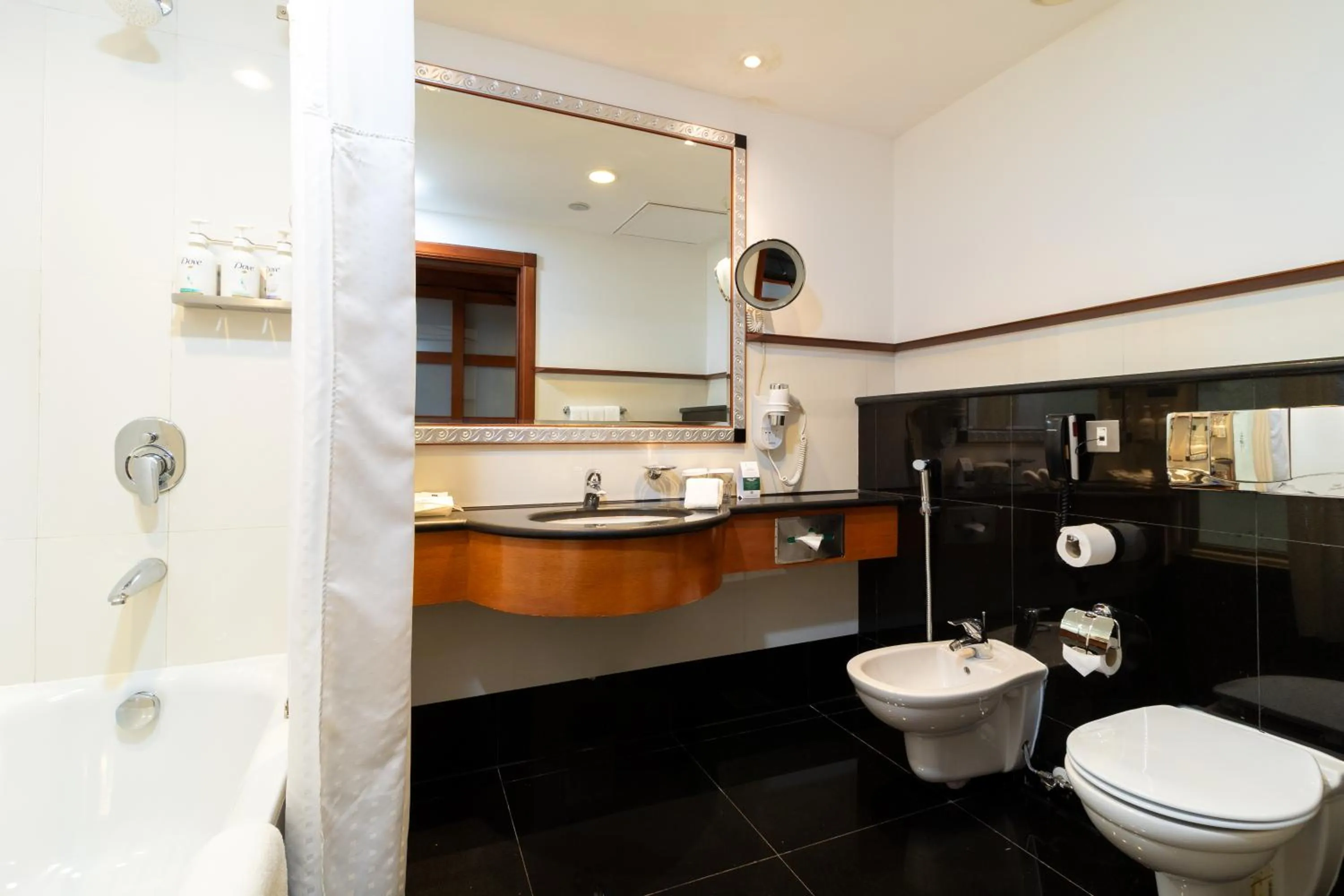 Bathroom in Holiday Inn Kuwait by IHG