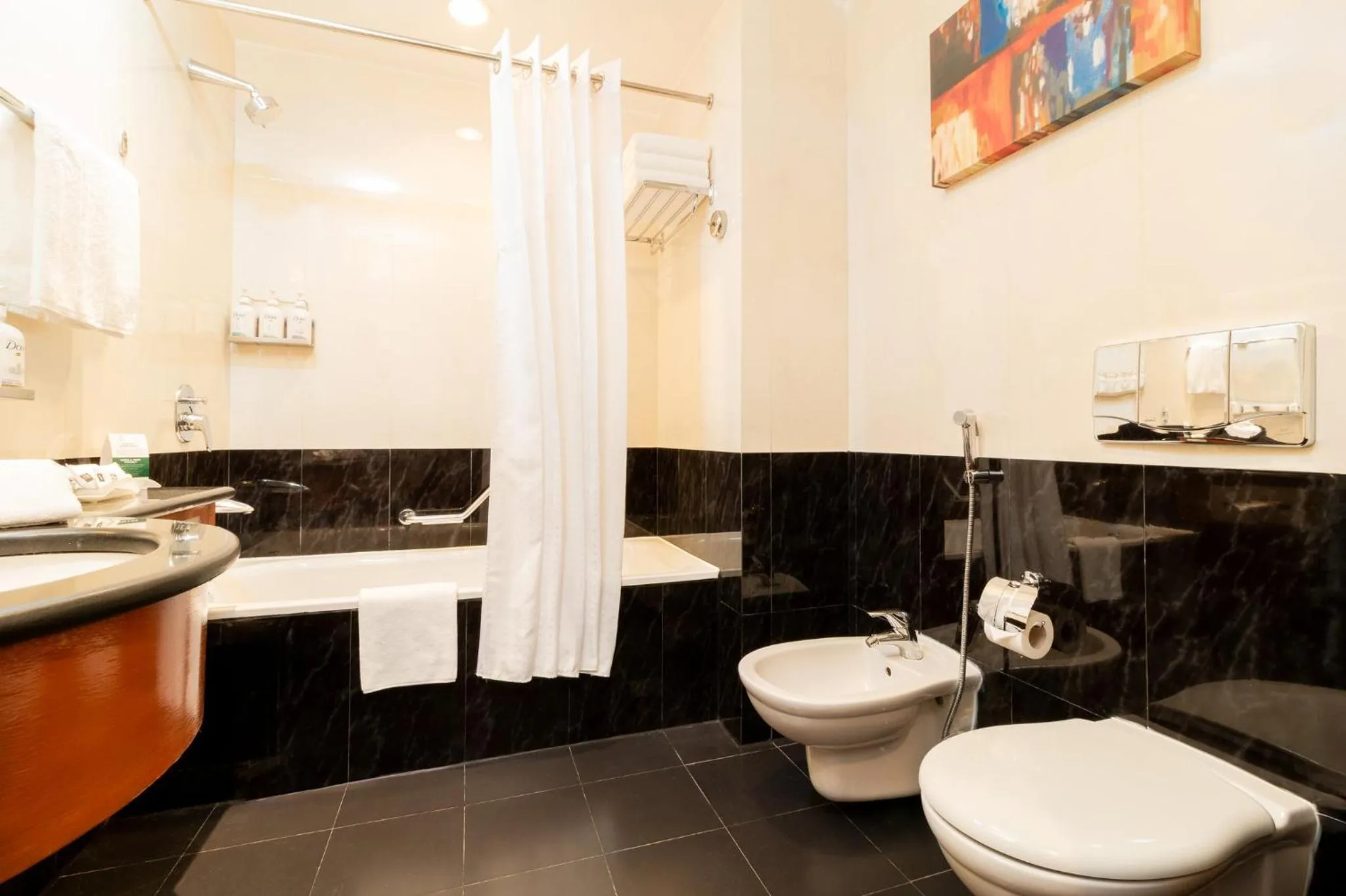 Bathroom in Holiday Inn Kuwait by IHG