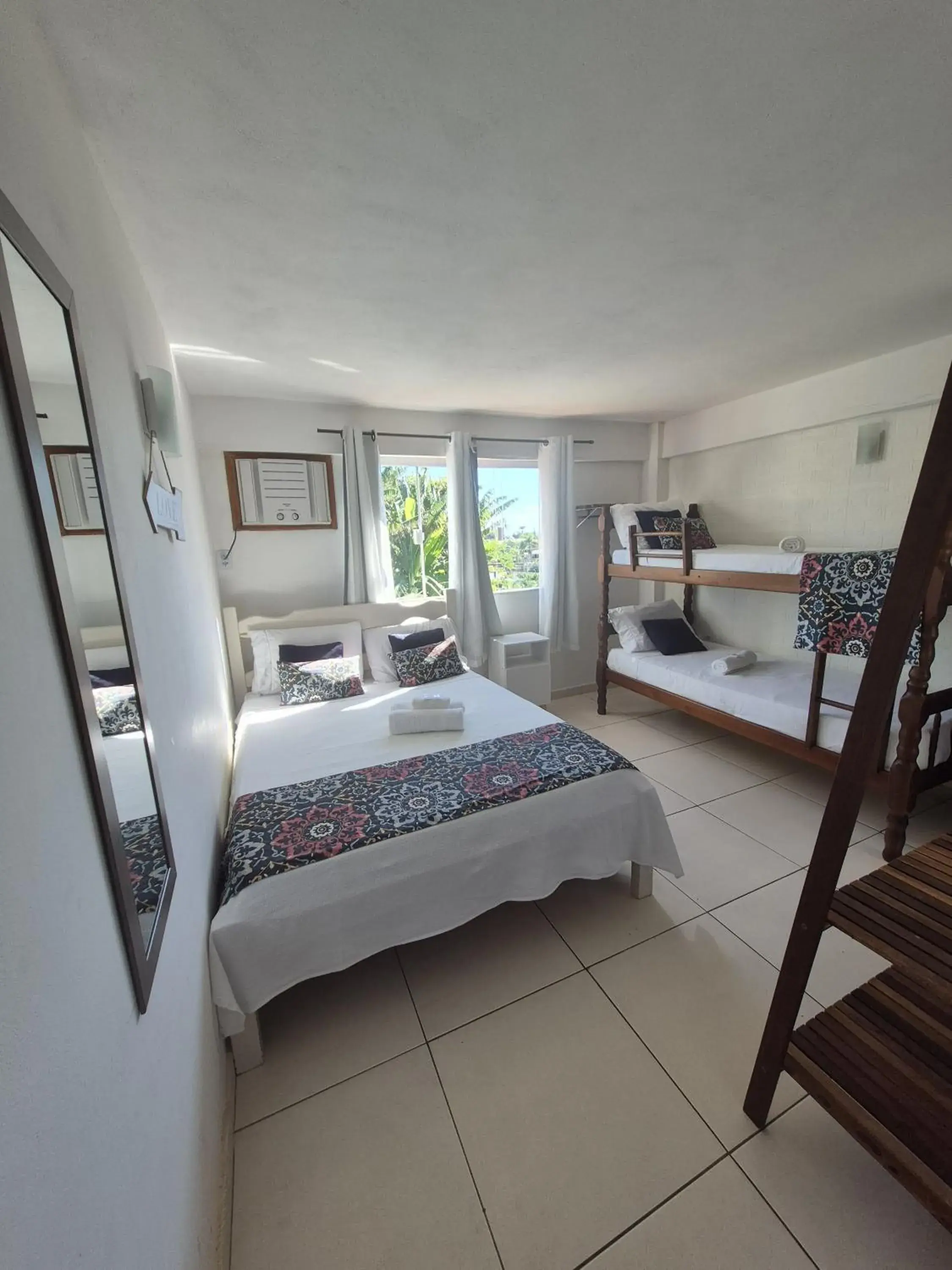 Quadruple Room with Garden View in Namorada Brava Guest House Quadruple Room with Garden View in Namorada Brava Guest House