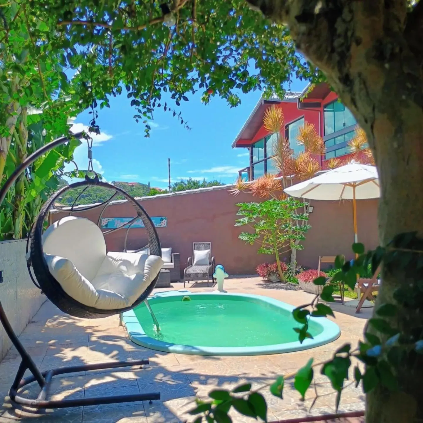 Swimming pool in Namorada Brava Guest House