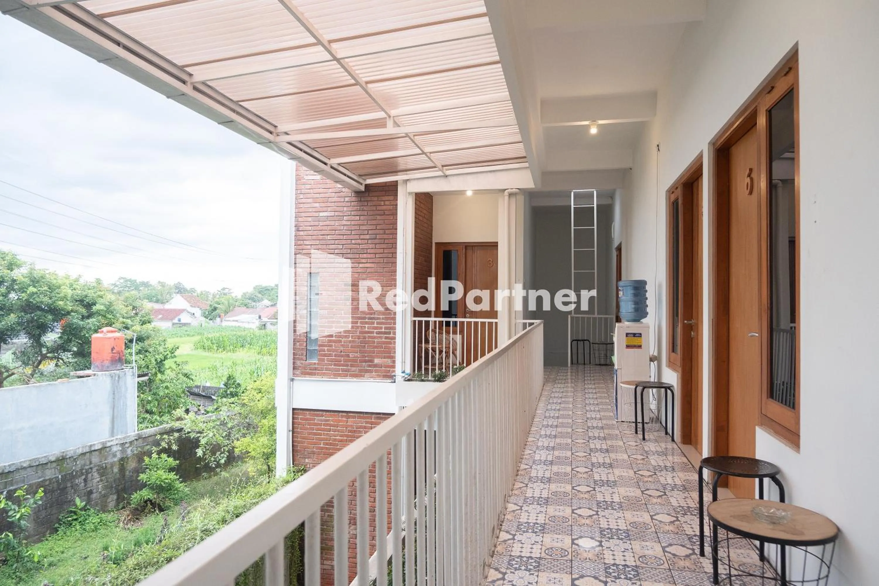 Balcony/Terrace in Twin House near UII Yogyakarta Mitra RedDoorz