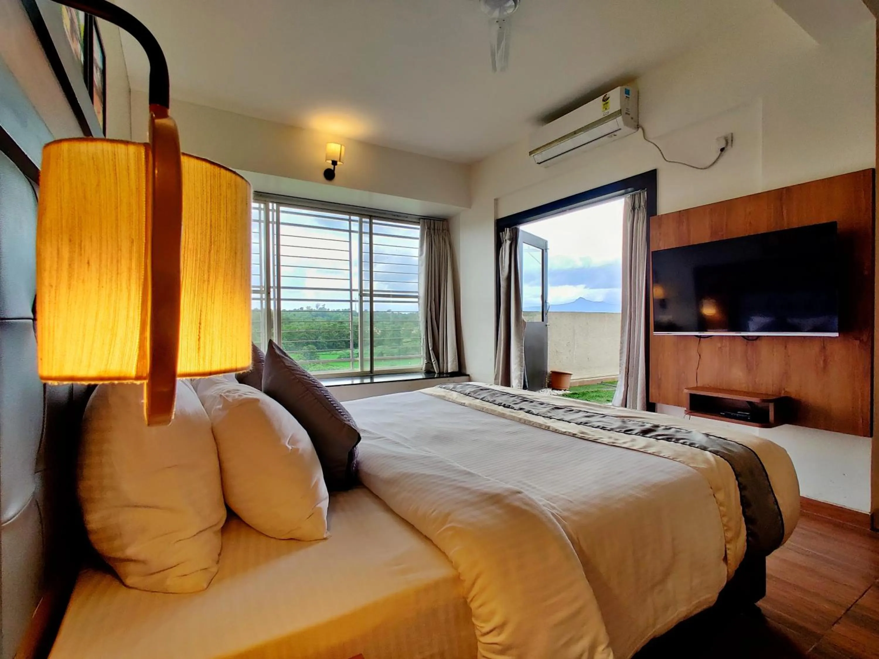 Bed in Pushpam Sanskruti Resort Karjat