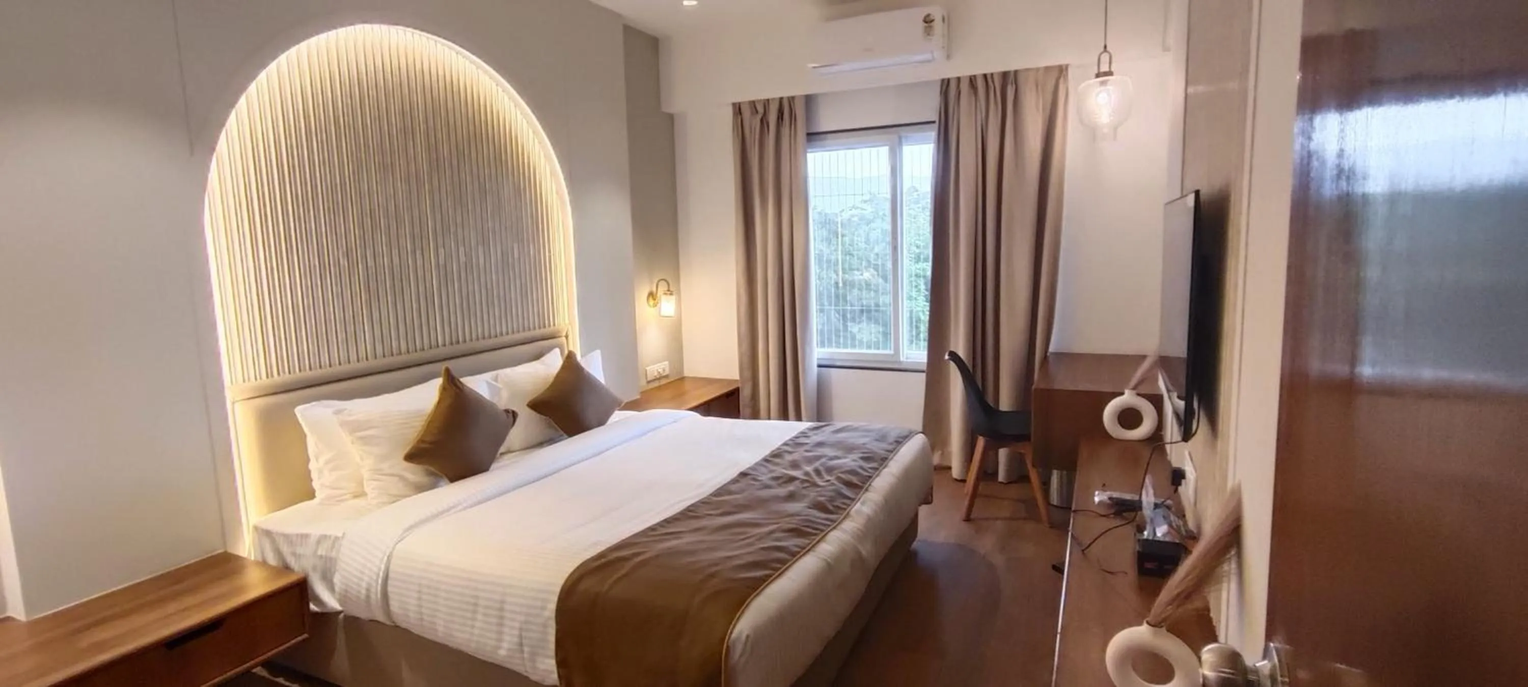 Bed in Pushpam Sanskruti Resort Karjat