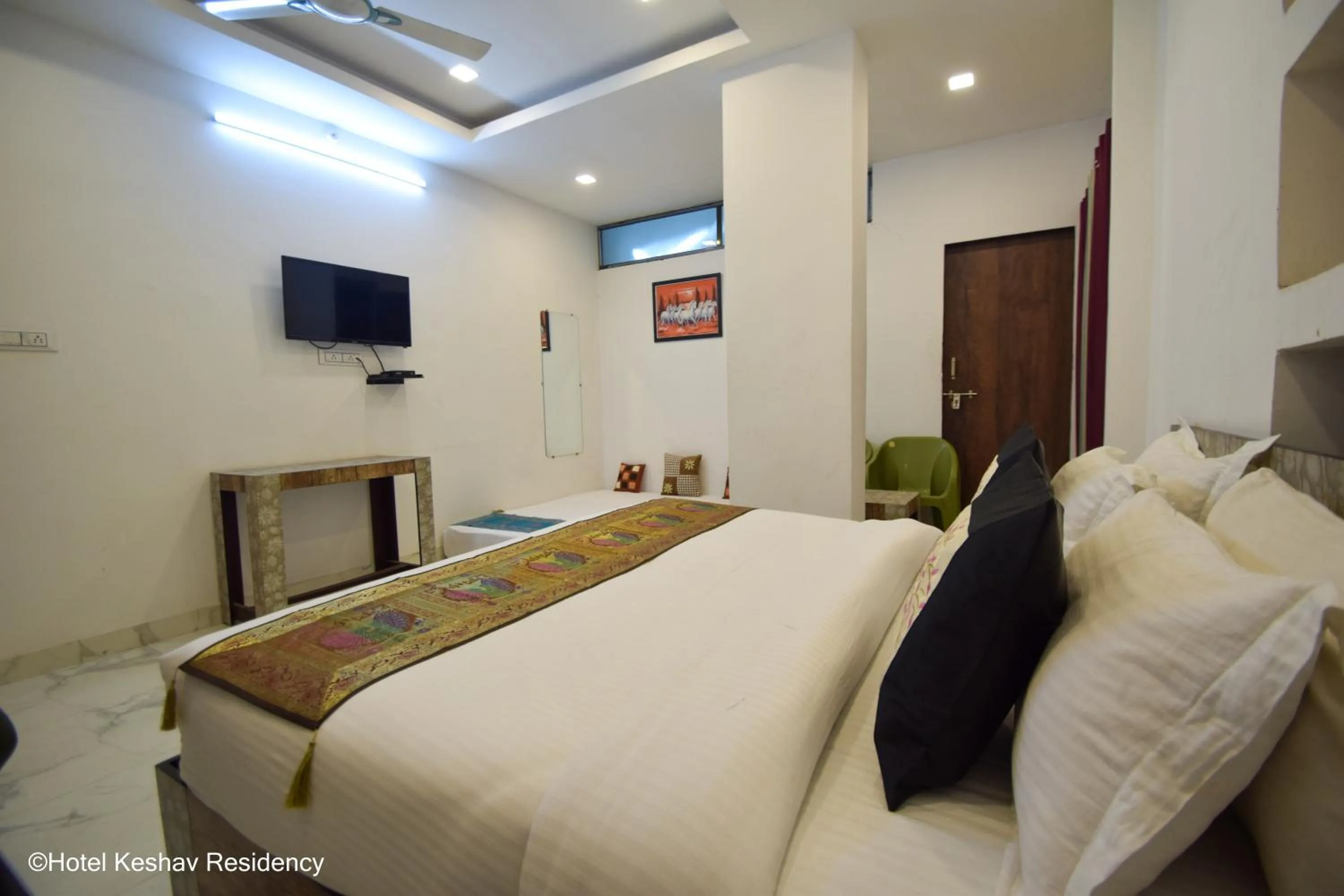 Photo of the whole room, Bed in Hotel Keshav Residency