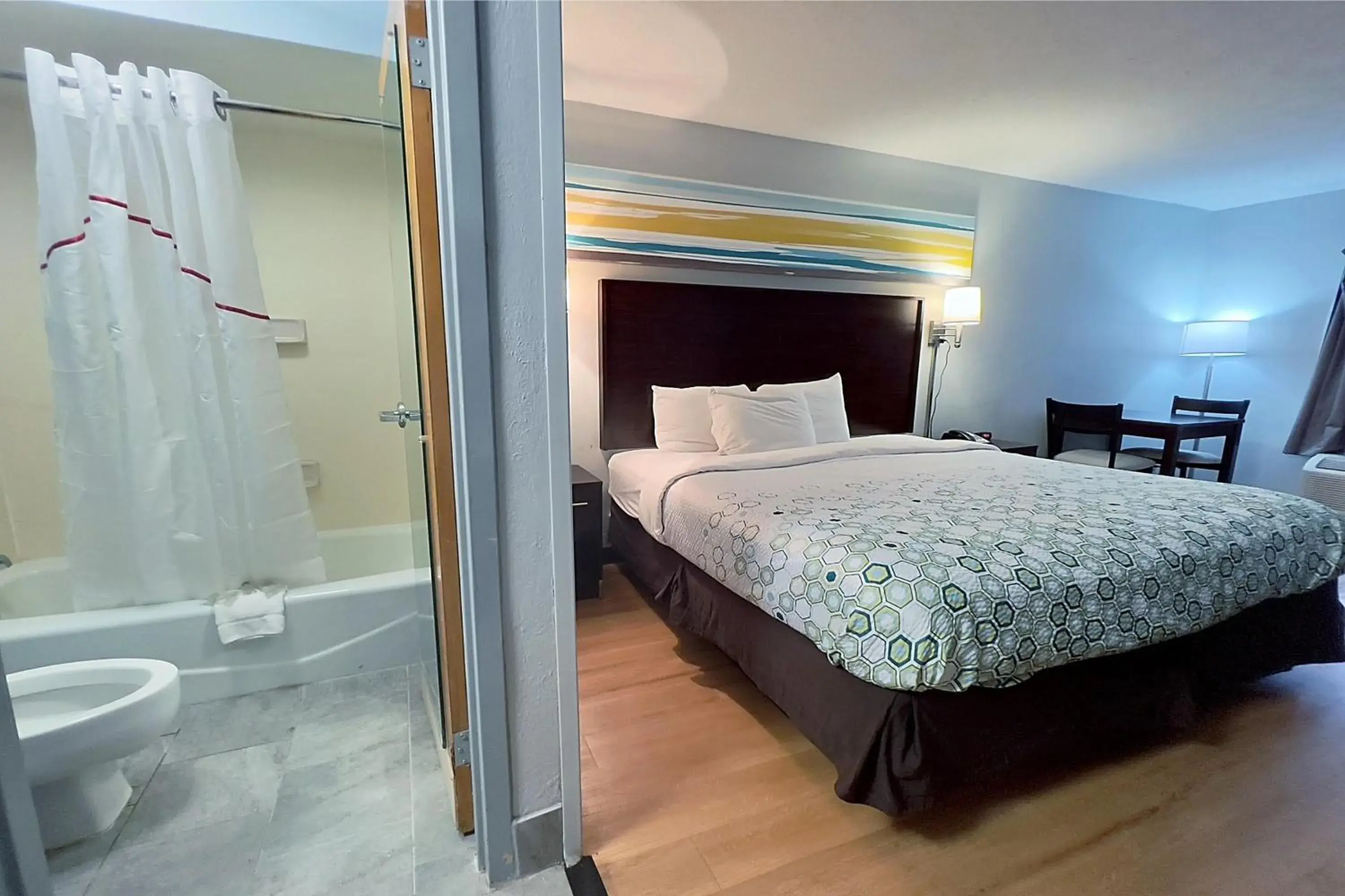 Bed in HomeTowne Studios by Red Roof Augusta Bed in HomeTowne Studios by Red Roof Augusta