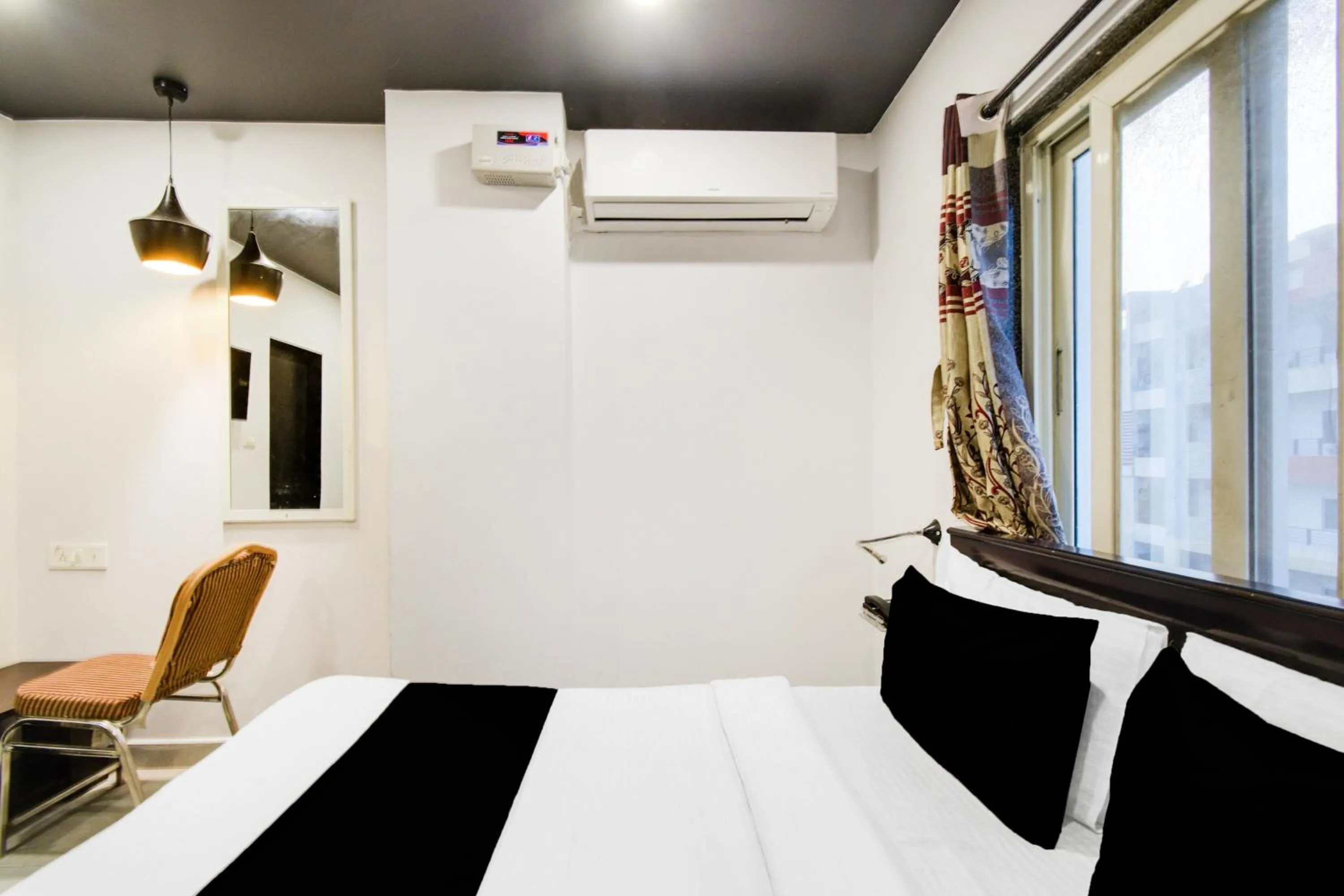 Bedroom, Bed in Super Townhouse Alwal Road