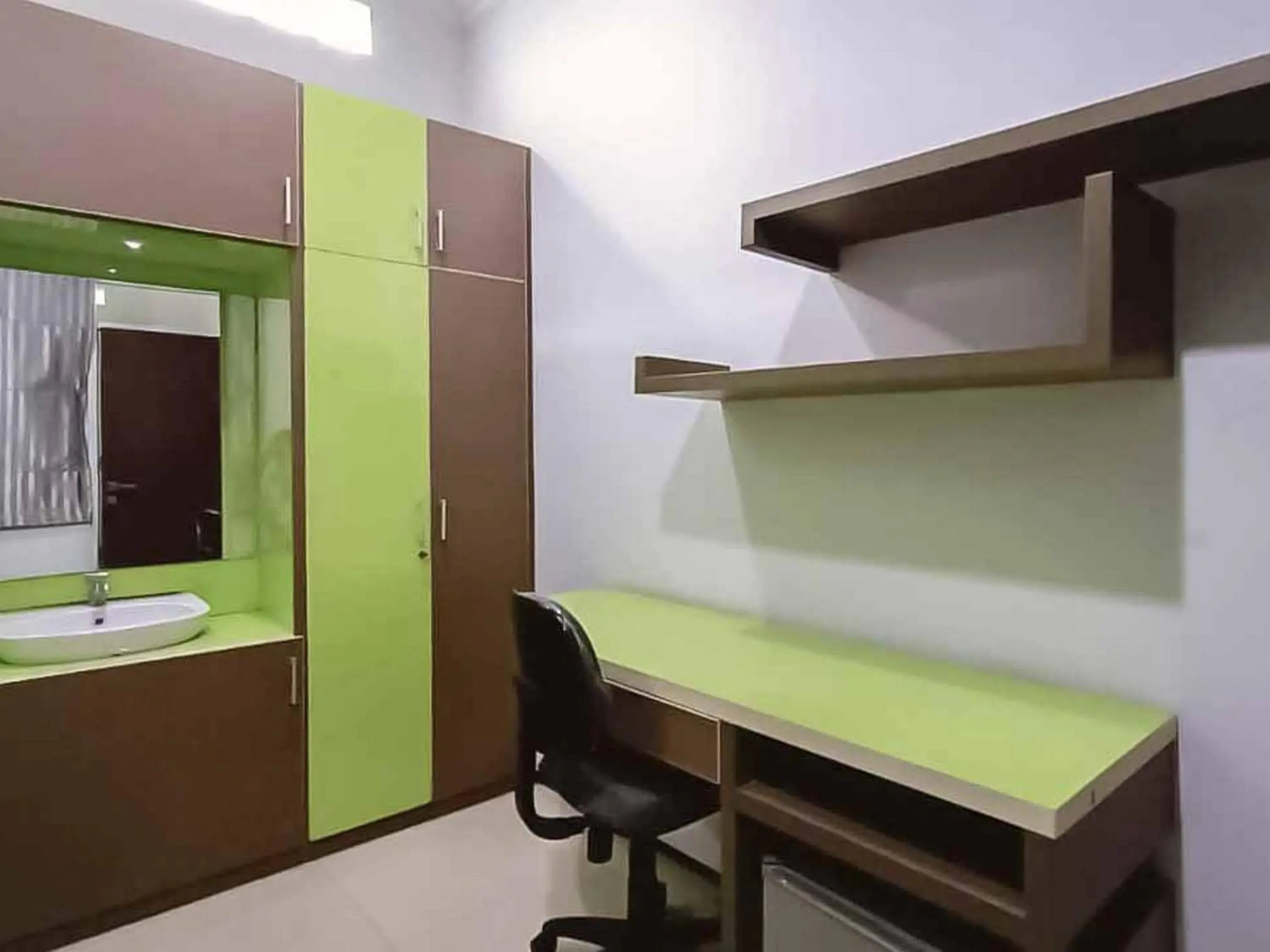 Bed in Aimer Guest House Syariah Mitra RedDoorz Bed in Aimer Guest House Syariah Mitra RedDoorz