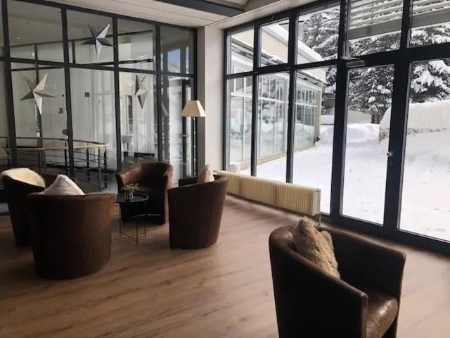 Lounge or bar in Hotel Schweizerhof Pontresina